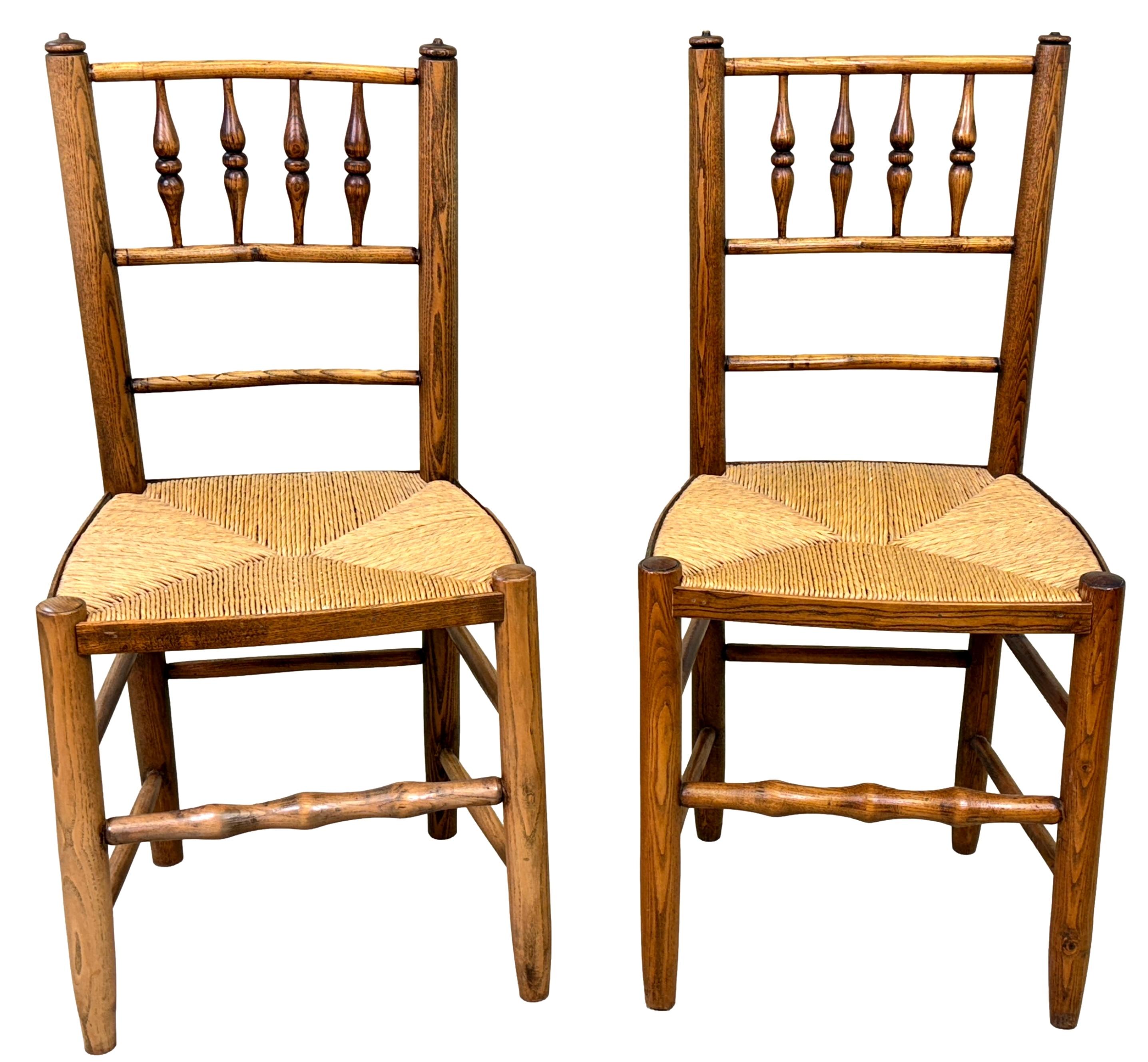 An Extremely Attractive Harlequin Set Of Eight, Mid 19th Century, Ash Kitchen Windsor Dining Chairs, In The Manner Of Philip Clissett, With Elegant Spindle Turned Decoration To Backs, Over Attractive Rushed Seats, Raised On Elegant Turned Legs With