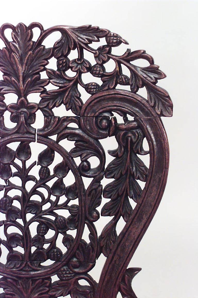 Set of 8 Asian Burmese (19th Cent) carved walnut shaped filigree side chairs with upholstered seat
