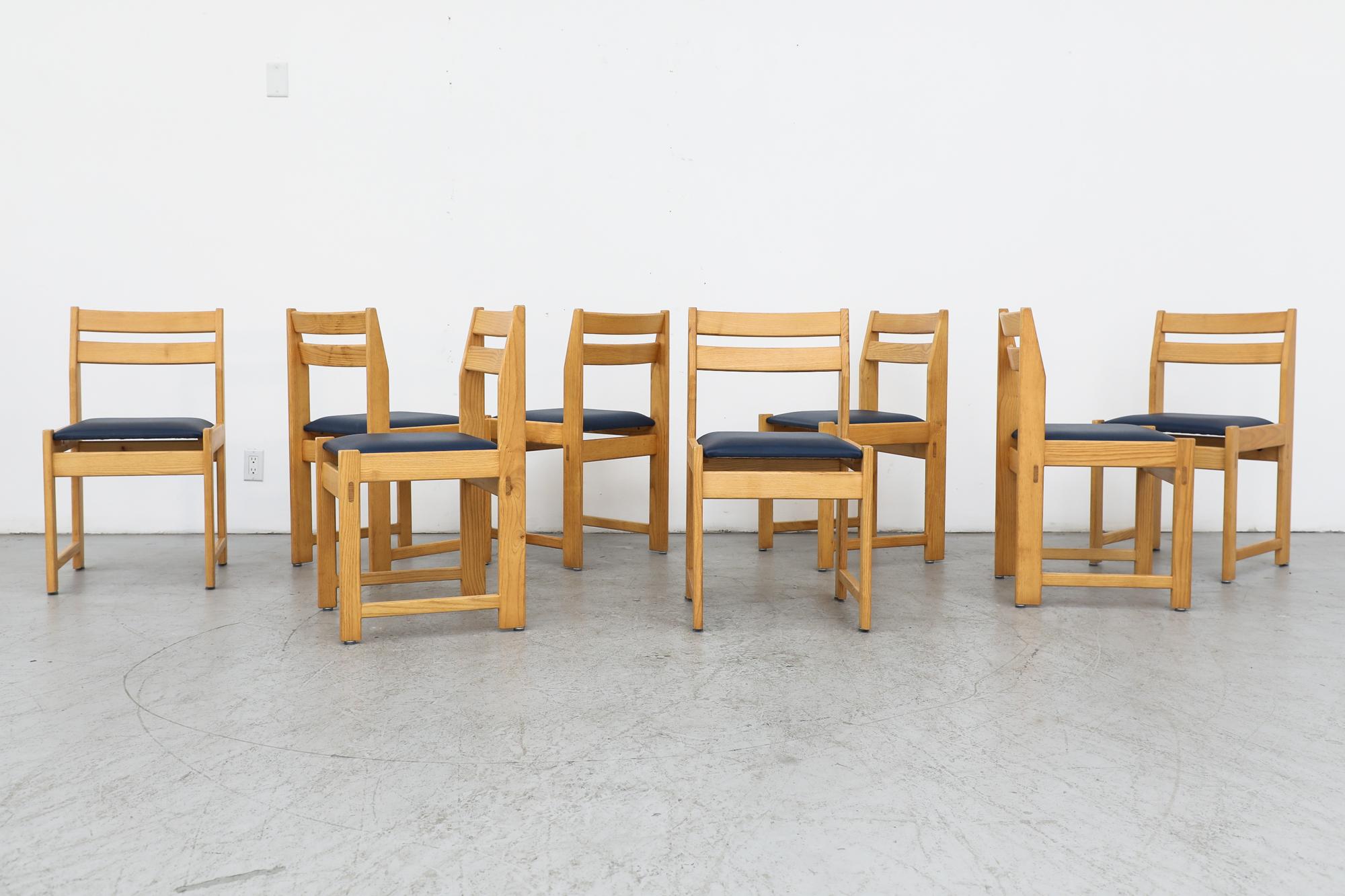 Set of 8 natural oak ladder back dining chairs by Ate van Apeldoorn for Houtwerk Hattem. Oak frames with slanted backrest and blue vinyl seat cushions. In original condition with visible wear consistent with their age and use. Set price. 