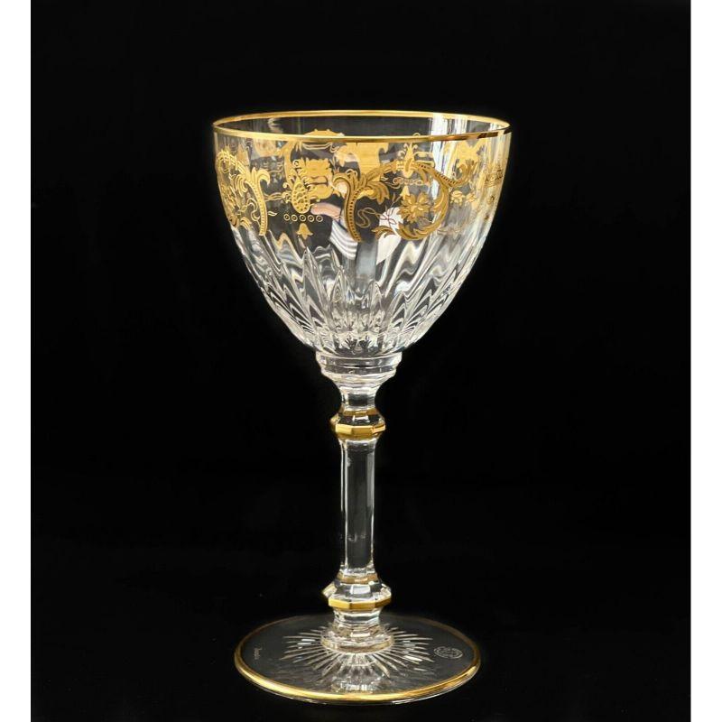 Set of 8 Baccarat France crystal glass wine glasses in imperator gilt scrolls

8 Baccarat France wine glasses glasses in Imperator. Clear glass with a cut pattern to the bowl and a gold encrusted foliate and scroll design to the edge. Gilt accents