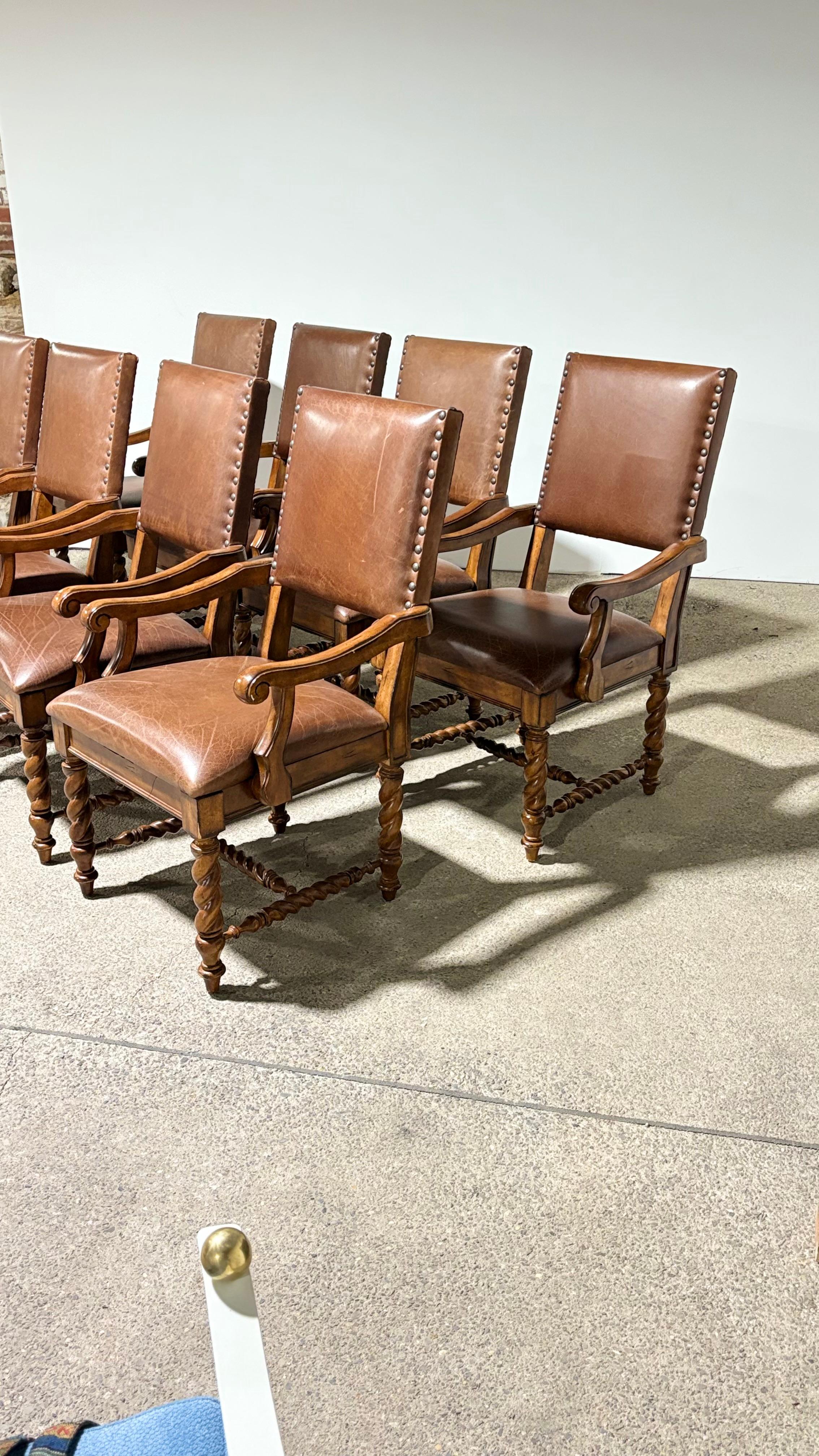 Fantastic set of eight dining chairs with oak barley twist frame and tastefully aged brown leather seat and back cushions.  This is a high-quality chair that combines traditional and western styles. Would be great for a mountain home or traditional
