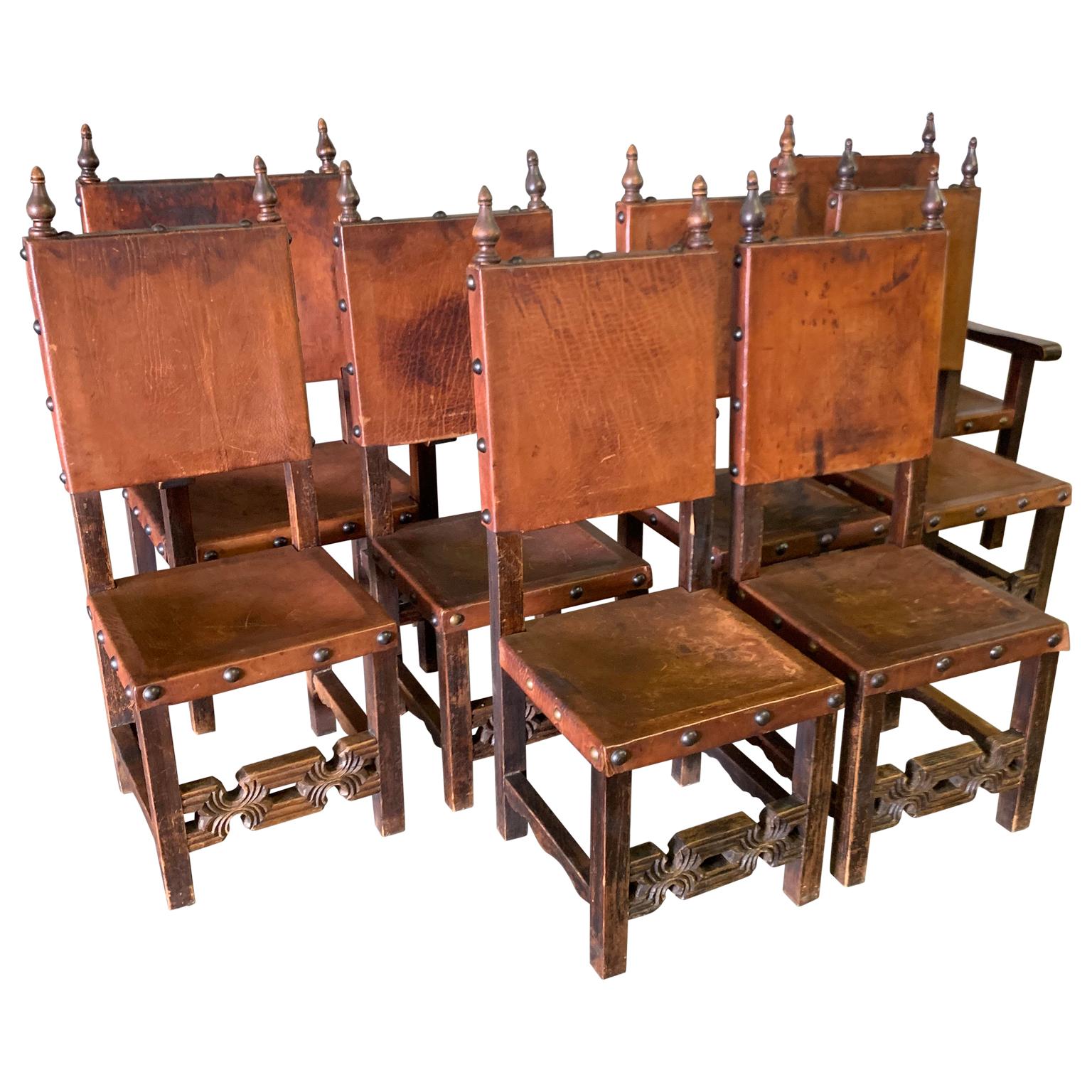 Set of 8 Baroque style leather dining room chairs
two armchairs and 6 dining room chairs.
