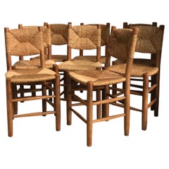 Set of 8 Bauche Model n°19 Chairs by Charlotte Perriand, France, 1950s