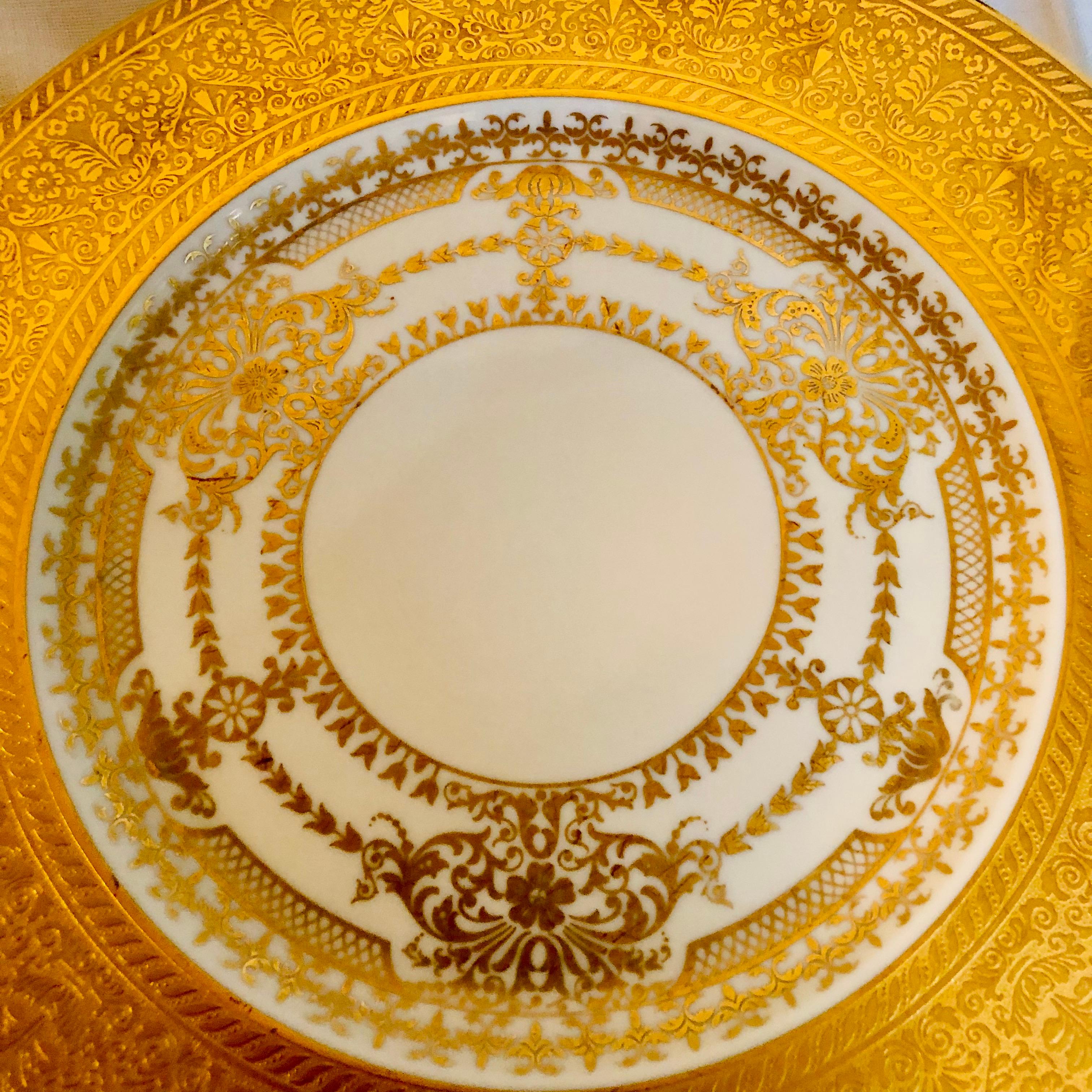 Porcelain Set of 8 Bavarian Service Plates with Thick Border of Gold Embossed Decoration