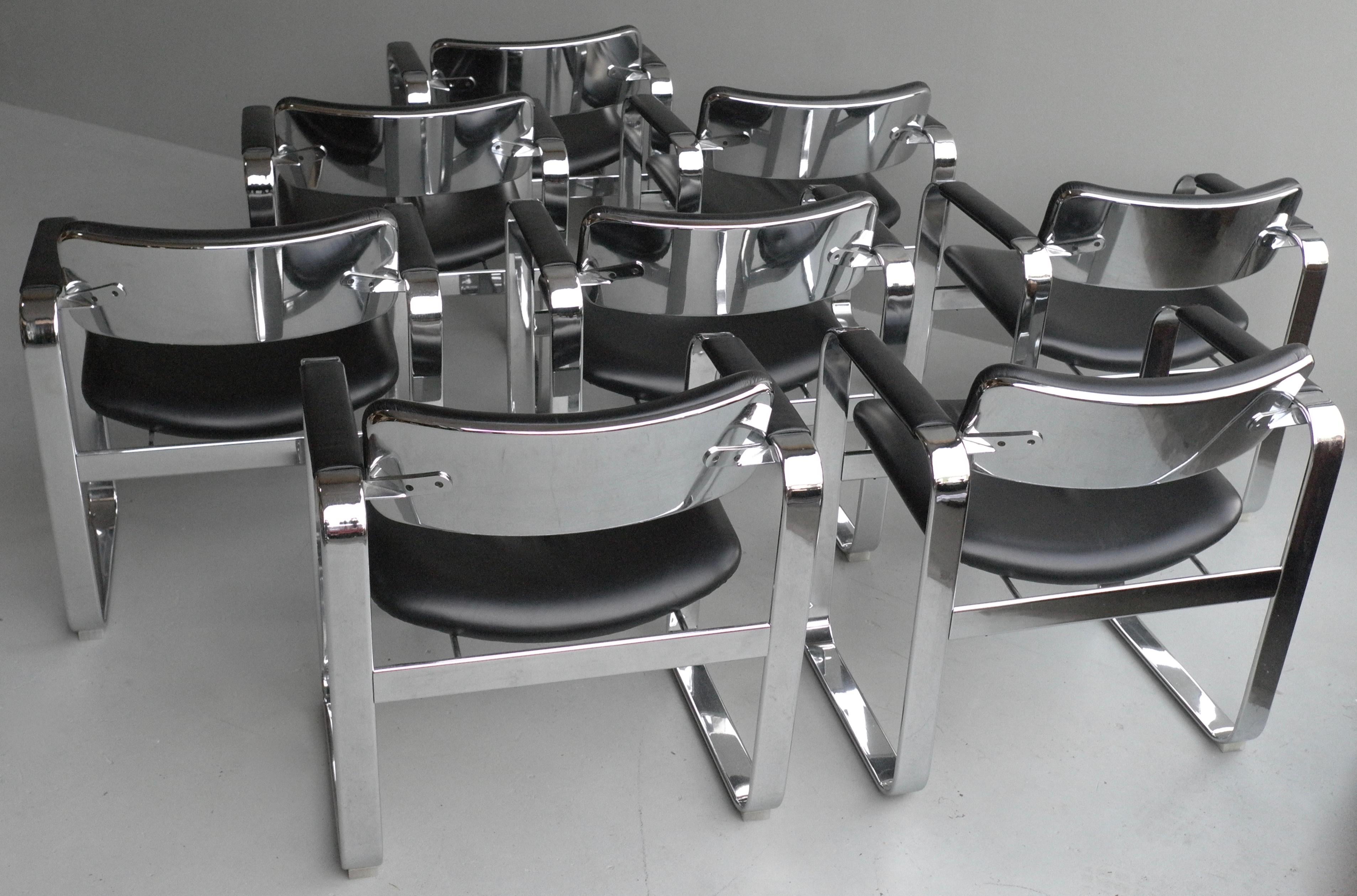 These executive chairs were designed by Eero Aarnio for Mobel Italia in 1968. They are made from faux black leather and chromed aluminium. These chairs shows a strong design with straight though friendly curved lines and meanwhile is very
