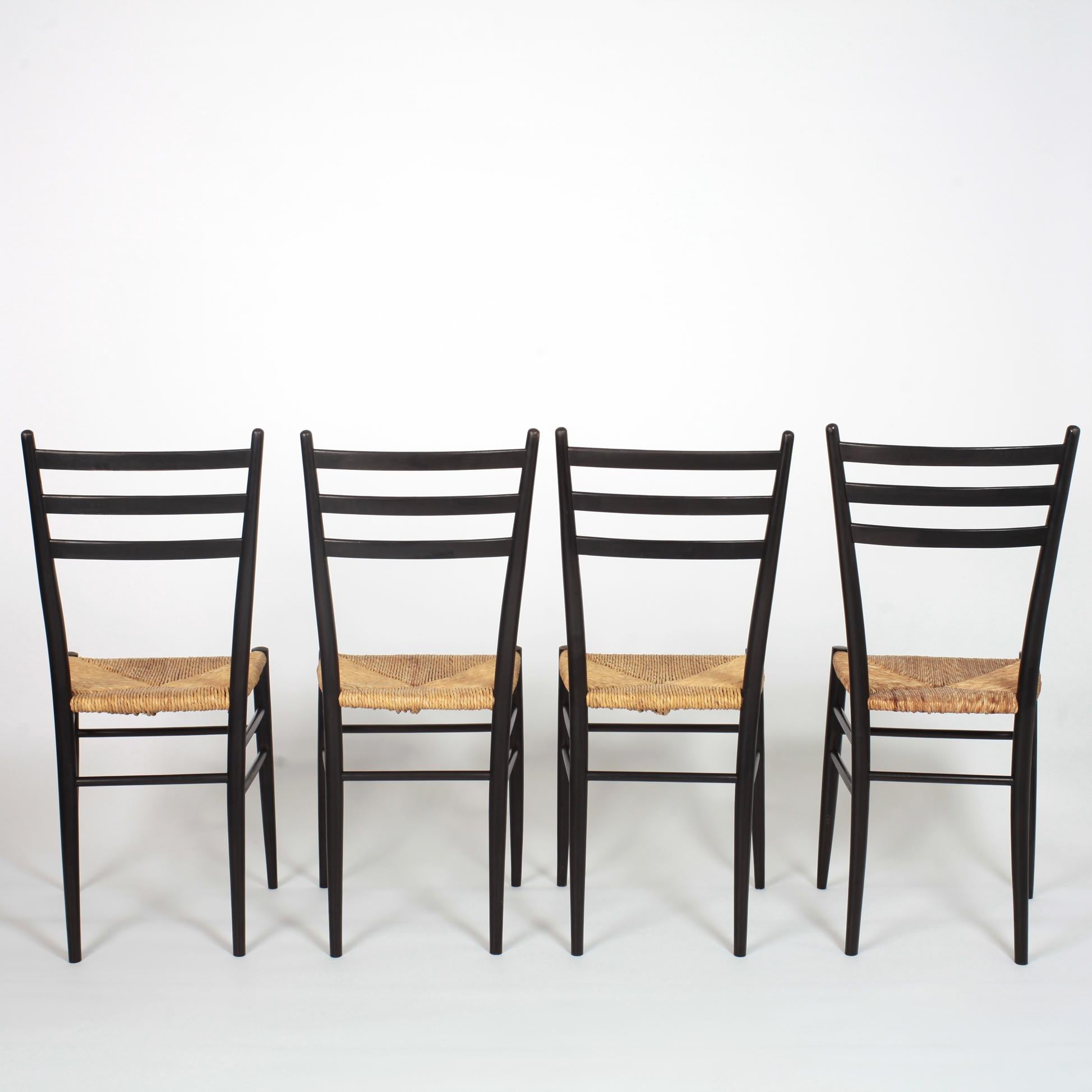Mid-Century Modern Set of 8 Black Wood and Straw Italian Chairs, 1960s
