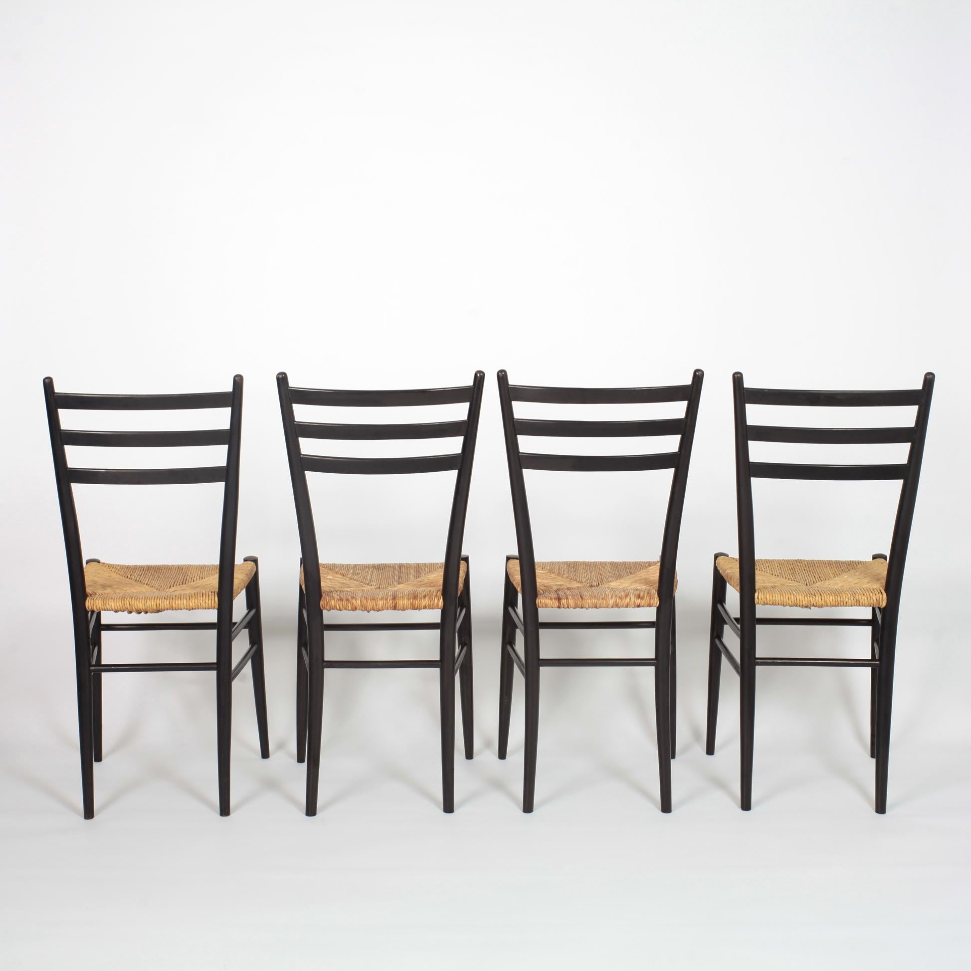 Mid-20th Century Set of 8 Black Wood and Straw Italian Chairs, 1960s