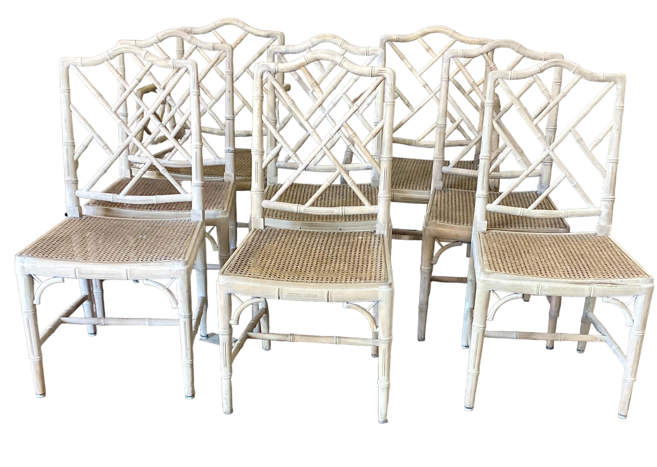 Set of 8 Bleached Chinese Chippendale Faux Bamboo Dining Chairs with caned seats. The side chairs measure 18”W x 17”D x 37.5H
