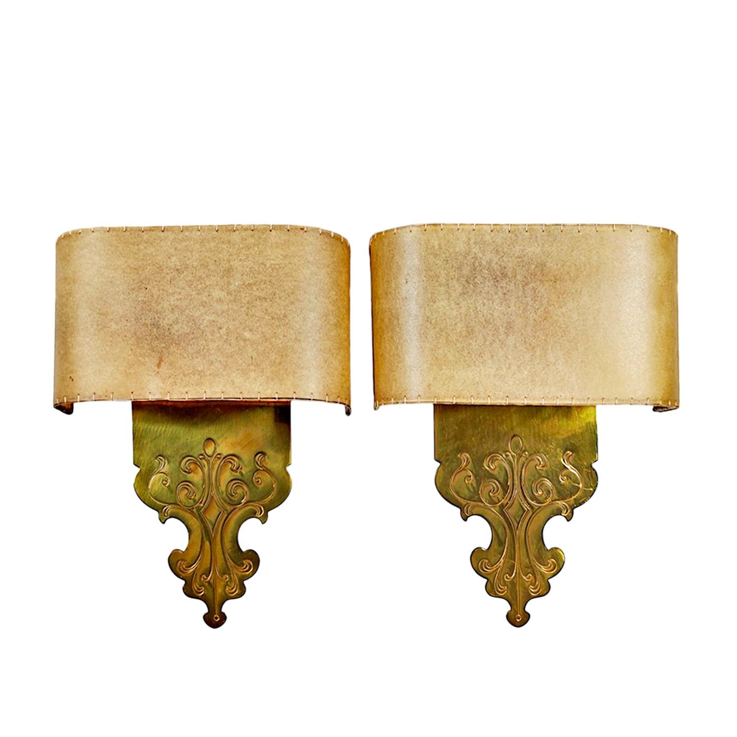 Set of 8 solid brass sconces decorated with engraved motifs, hand-sewn parchment shades.

Spain circa 1960

Dimensions
cm 24,5 x 9 x 28.5 – lampshade 12,5 (height)
inches 9.64 x 3.54 x 11.22 – lampshade 4.92 (height)