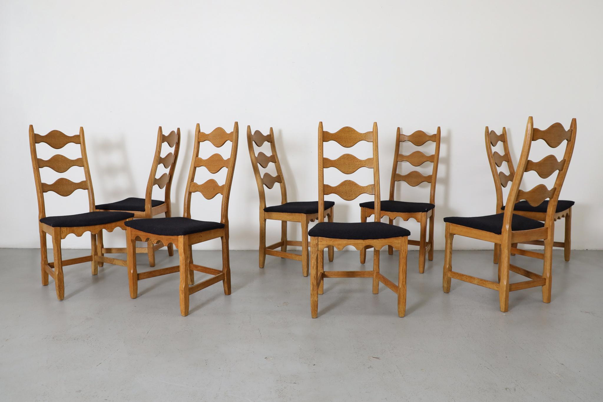 Set of 8 Henning Kjaernulf designed these extraordinary Brutalist dining chairs with sculptural decorative backs. Each chair features solid oak construction with undulating cutout patterns that create dramatic play of light and shadow. Kjaernulf's