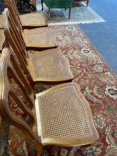 Set of 8 caned chairs in Louis XV style