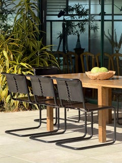 Set of 8 cantilever Bauhaus style dining chairs, 20th century