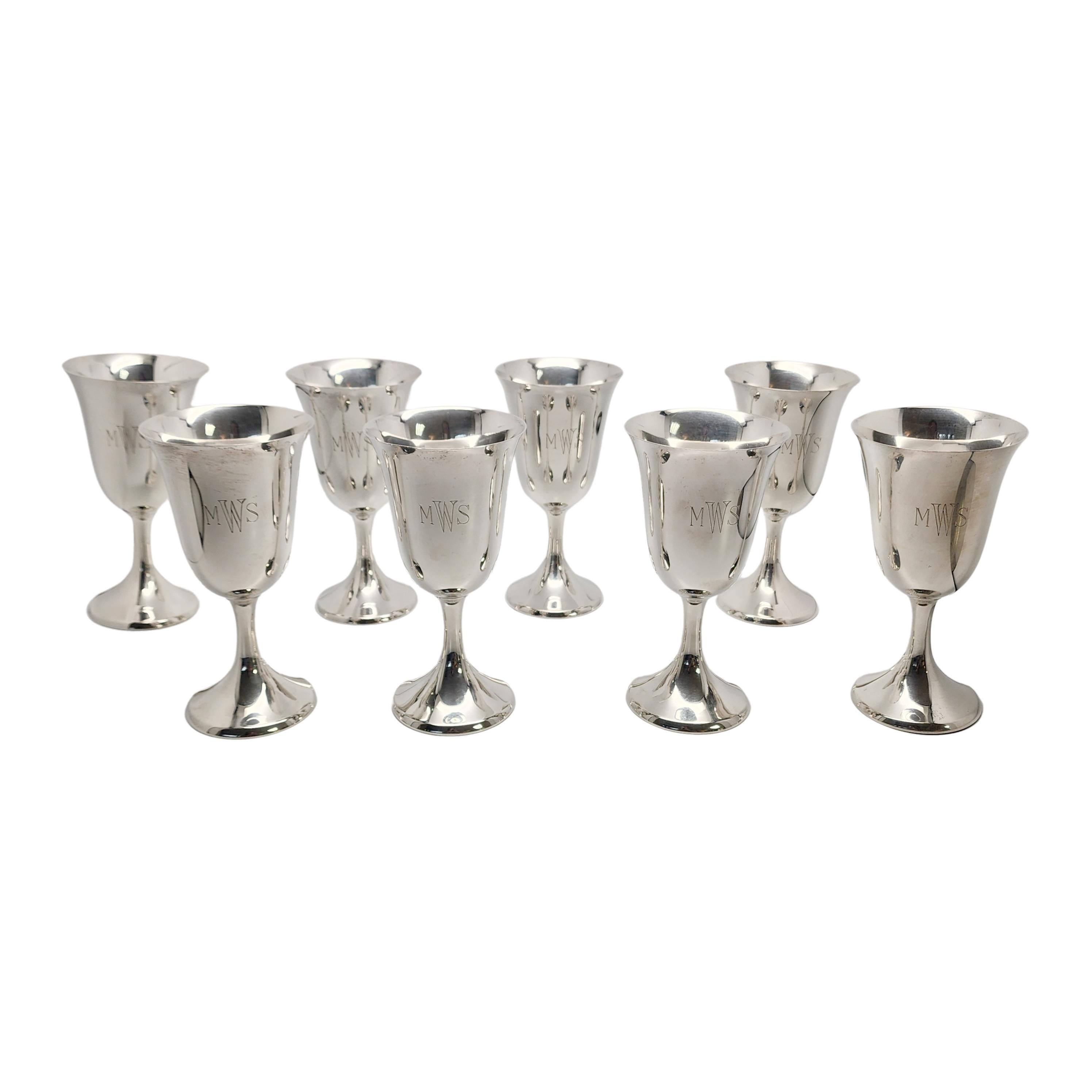 Set of 8 sterling silver water goblets by Cartier.

Engraving appears to be MWS on each goblet (see photo).

A simple and classic polished design with a long deep cup and short stem. Slightly out-turned rim.

Measures approx 6 1/2