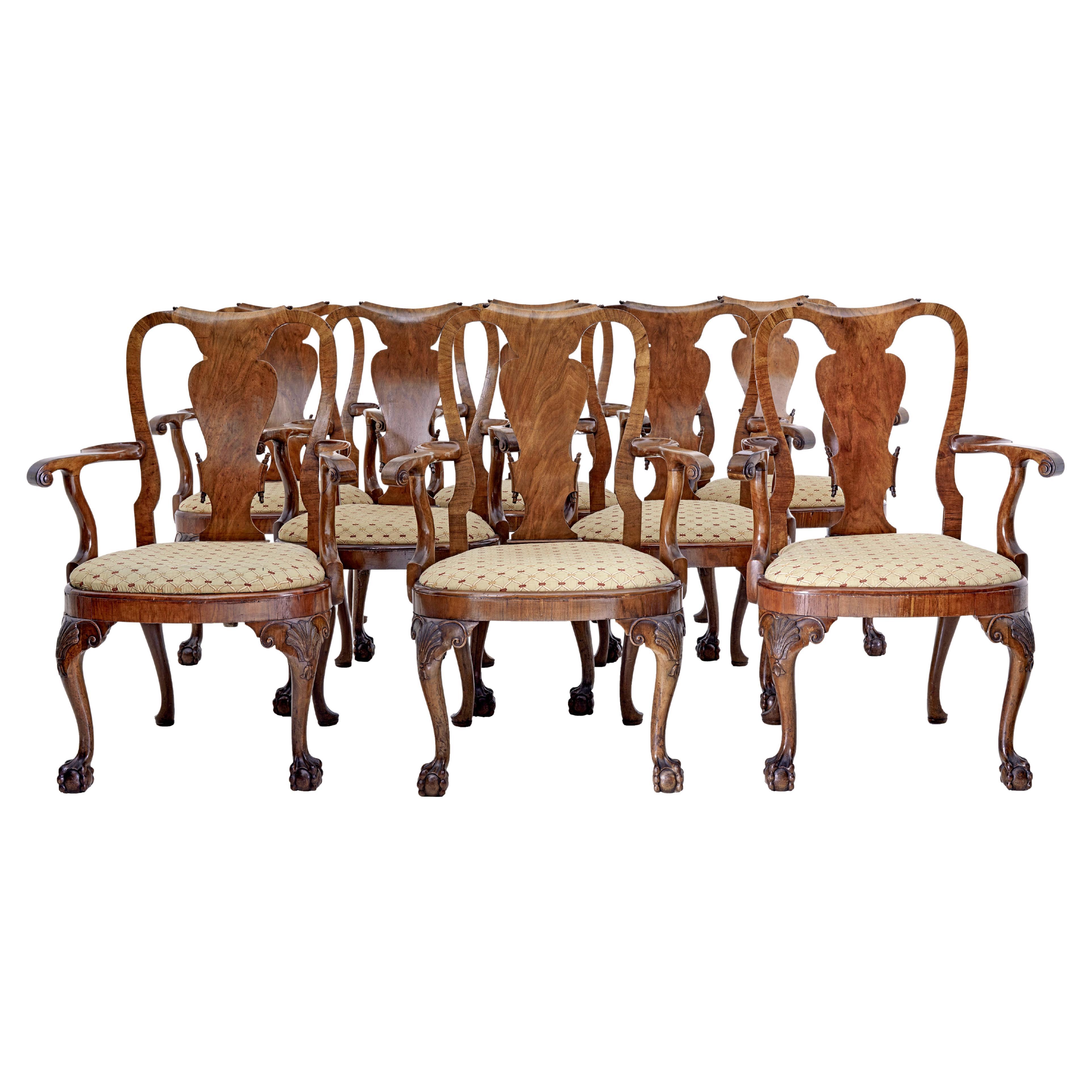 Set aus 8 geschnitzten Esszimmerstühlen aus Nussbaumholz von Spillman & Co im Angebot