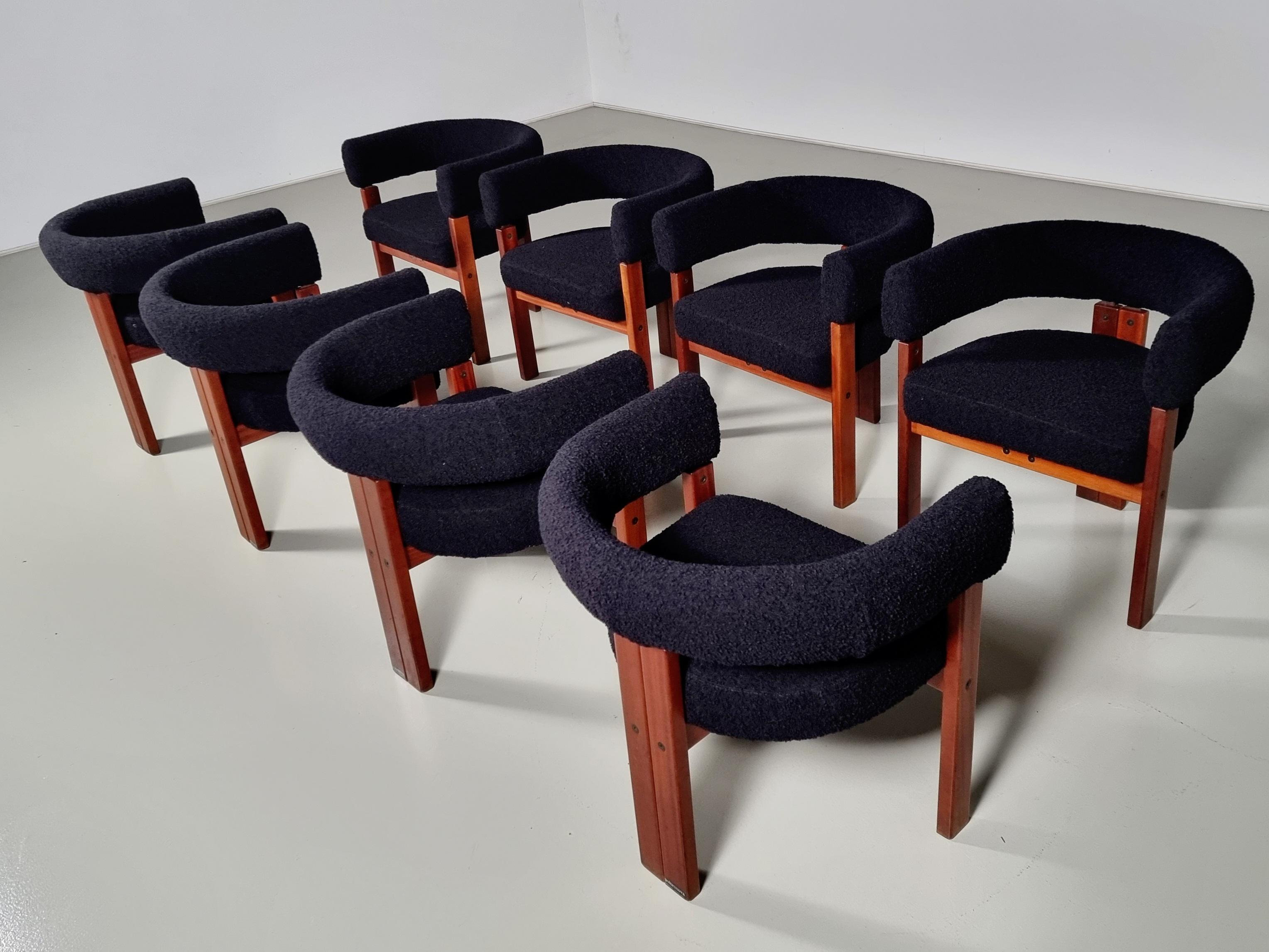 Ettore Sottsass set of 8 dining/cocktail chairs for Poltronova, Italy, in the 1970s. A simplistic yet very strong design in lines and proportions. Wonderful solid teak wooden frame, which runs over into the big-size armrests for maximum comfort. The