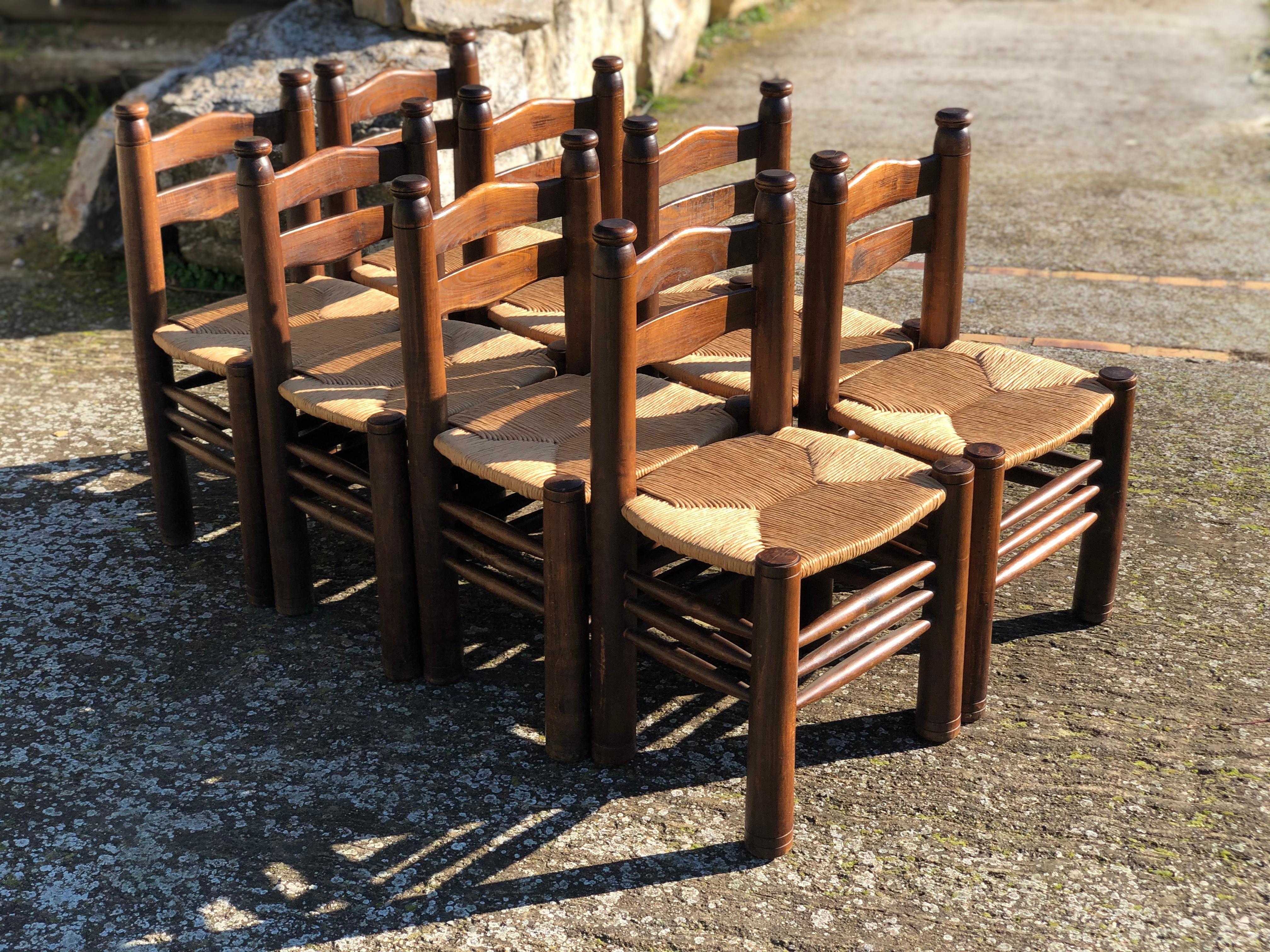 Set of 8 chairs Brutalist Charles Dudouyt oak, 1940.
Dimensions : 80 x 46 x 40 cm.