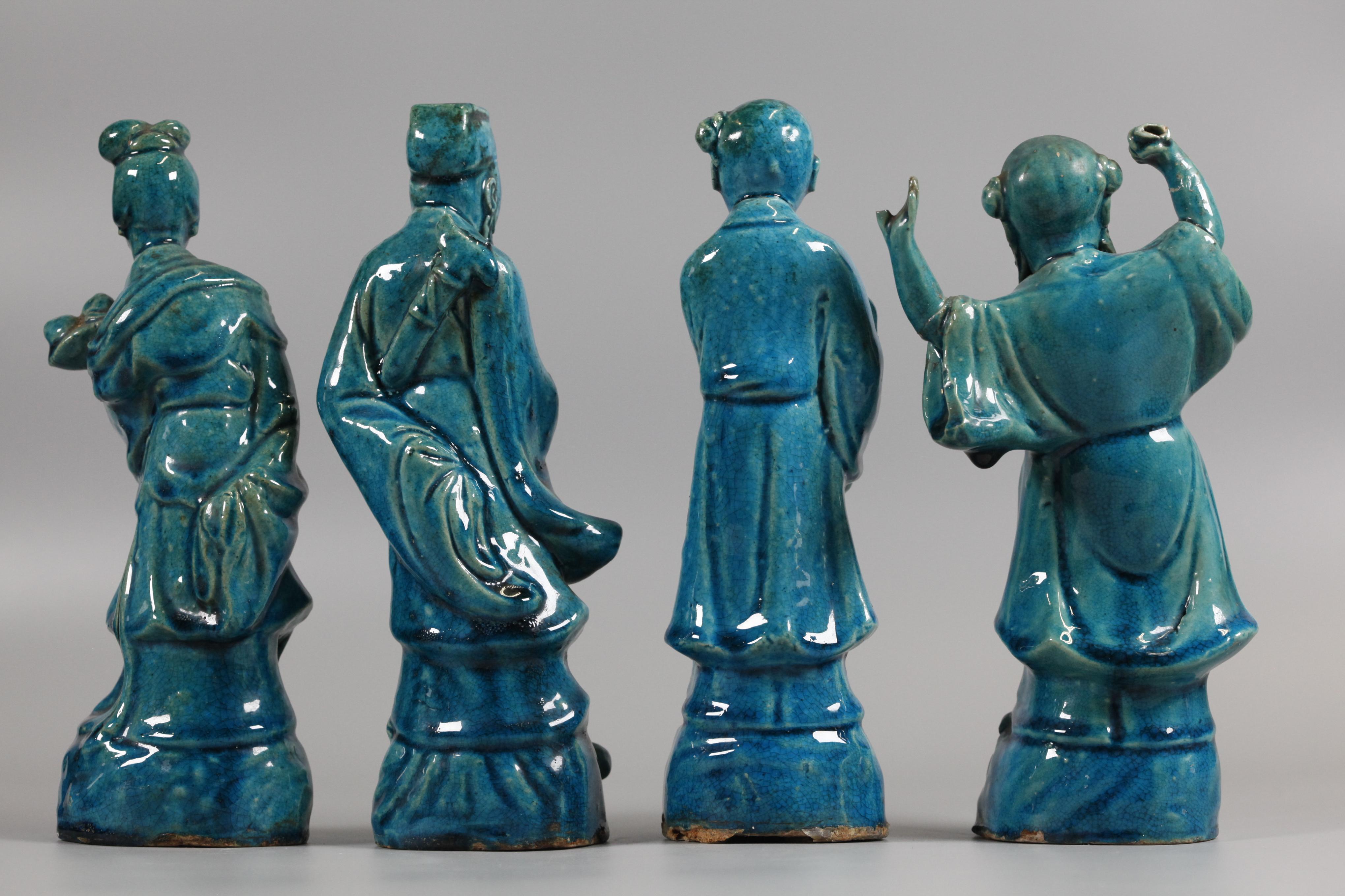 set of 8 Chinese turquoise glazed porcelain immortals, 19th c. In Good Condition For Sale In New York, NY
