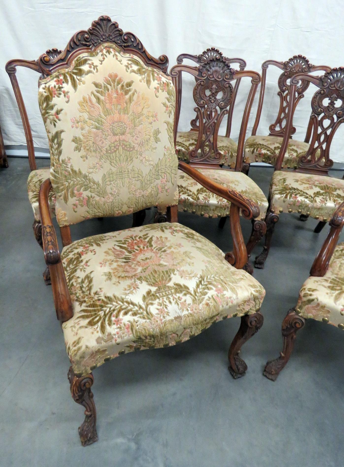 Set of 8 Chippendale style dining room chairs with textured upholstery. The arm chairs with upholstered backs measure 46.5