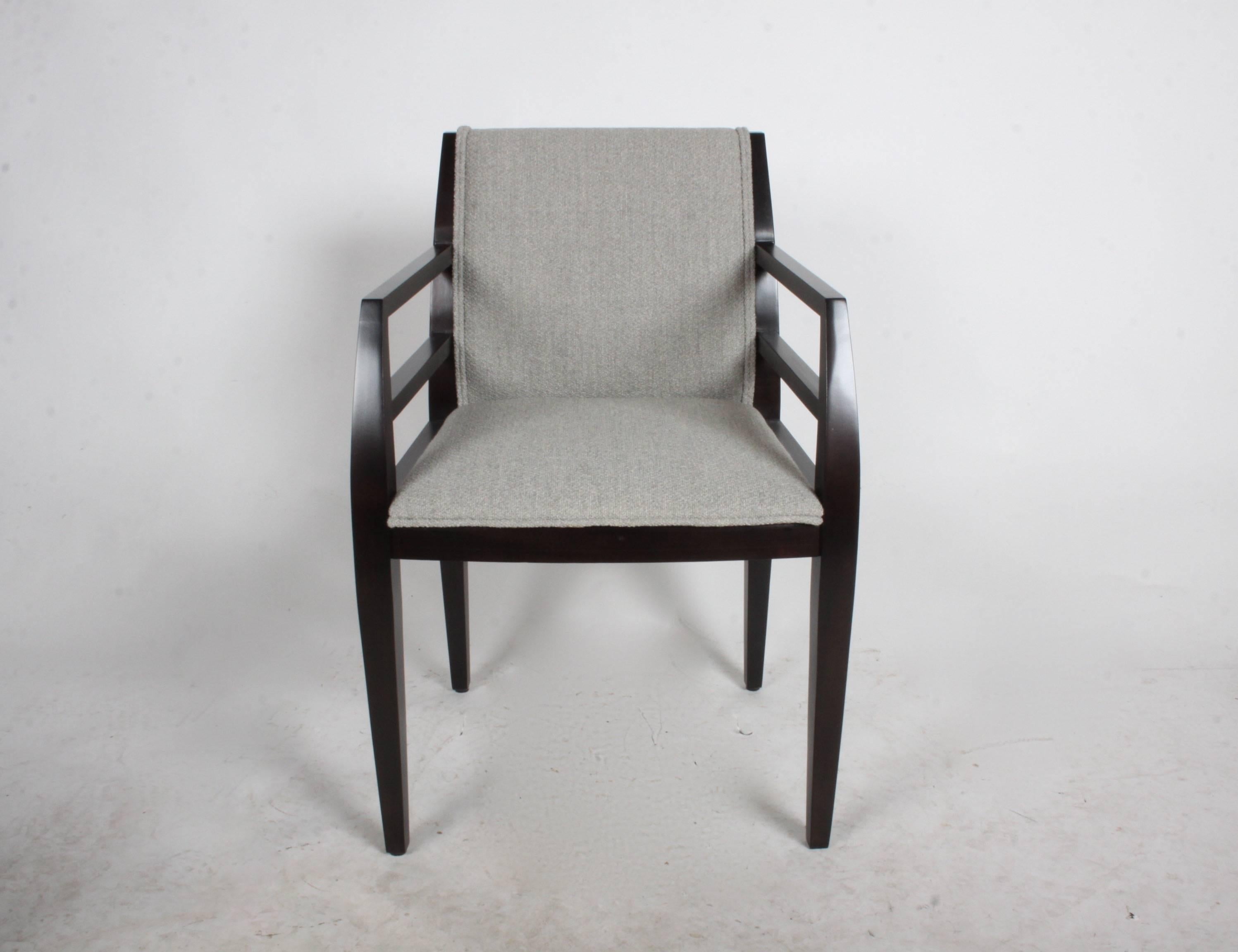 Set of eight Arbat cubist arm dining chairs designed by architect Constantin Boym for Brickell. The chairs bold lines are inspired by Russian Constructivist architecture. Refinished hard maple frames in an ebony stain, includes re-upholstery COM.