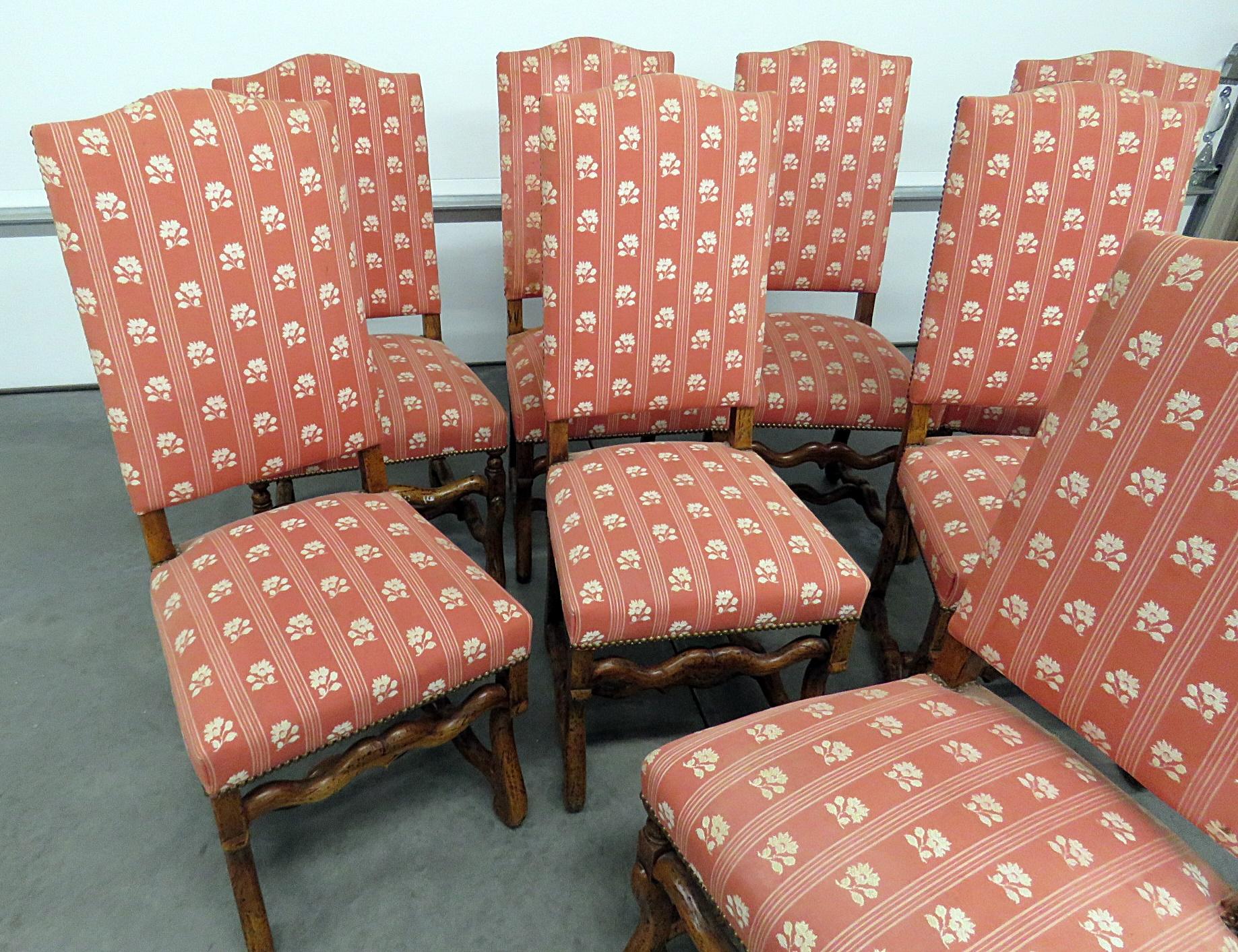 Set of 8 country French side chairs with nail head trim.