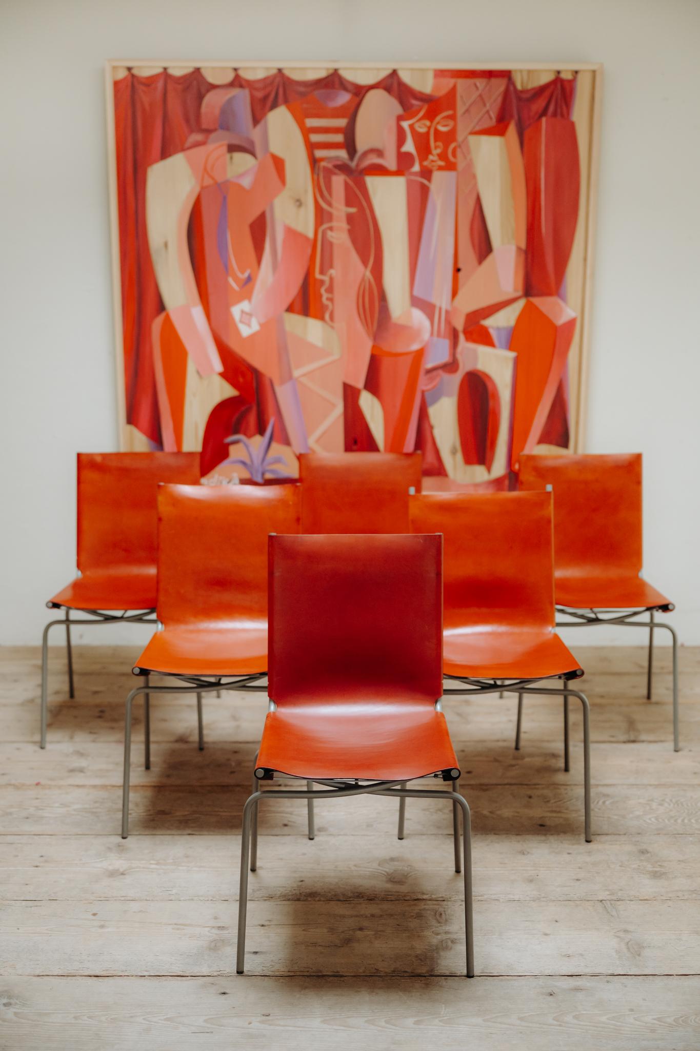8 stühle mit gekreuzten beinen aus rotem leder von Fabian Van Severen (Stahl) im Angebot