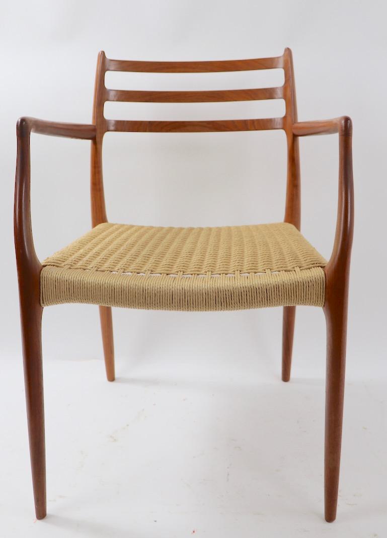 Scandinavian Modern Set of 8 Danish Modern Dining Chairs by Neils O. Moller for Jl. Moller