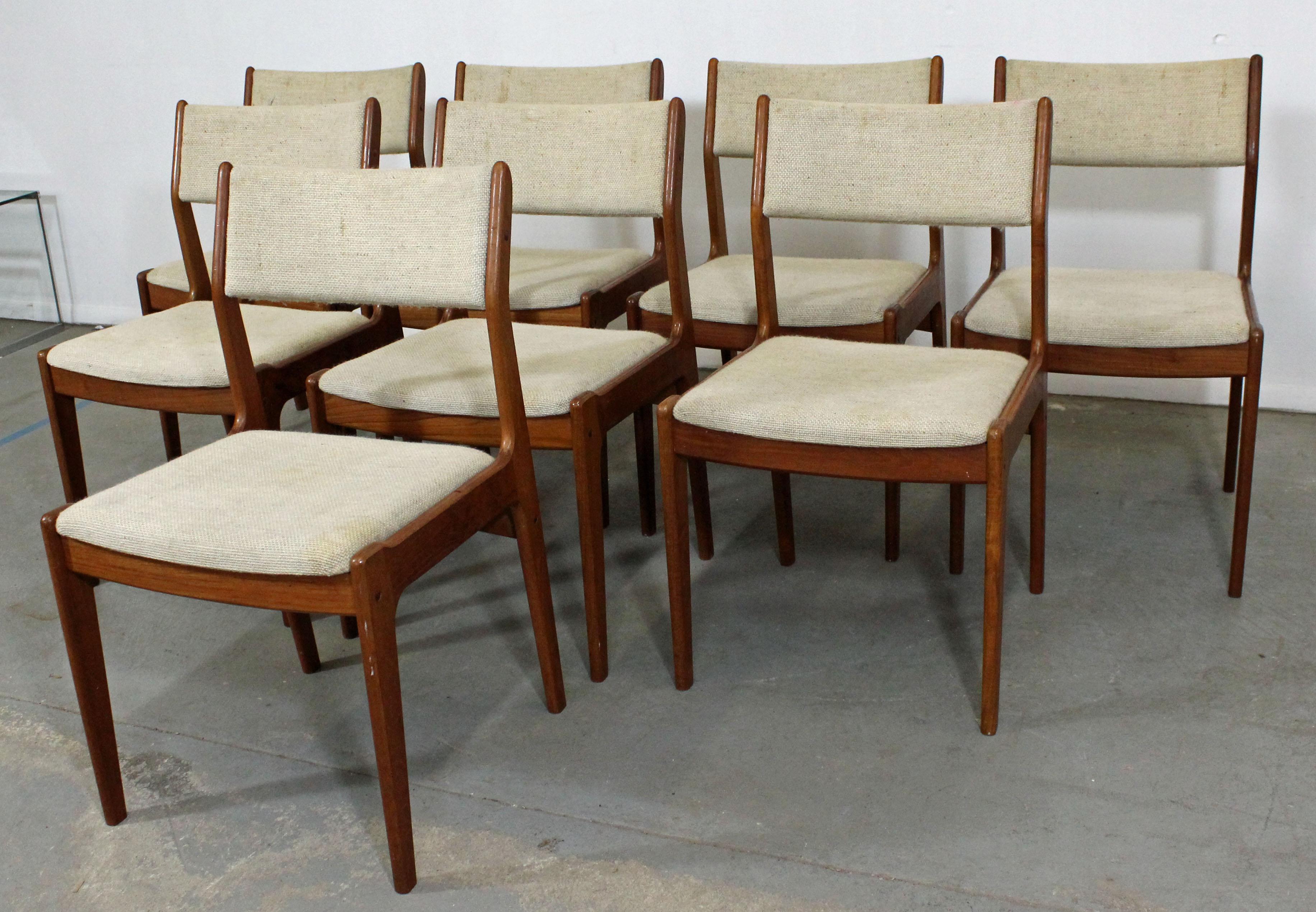 Offered is a set of 8 Danish modern teak side or dining chairs. The set is in decent, structurally sound condition, but need to be reupholstered. They are not signed. Check our other listings for more Midcentury and Danish modern