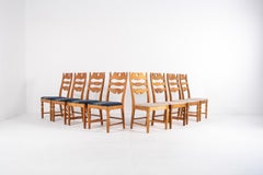 Set of 8 Danish Oak Chairs by Henning Kjærnulf, Denmark, 1960s