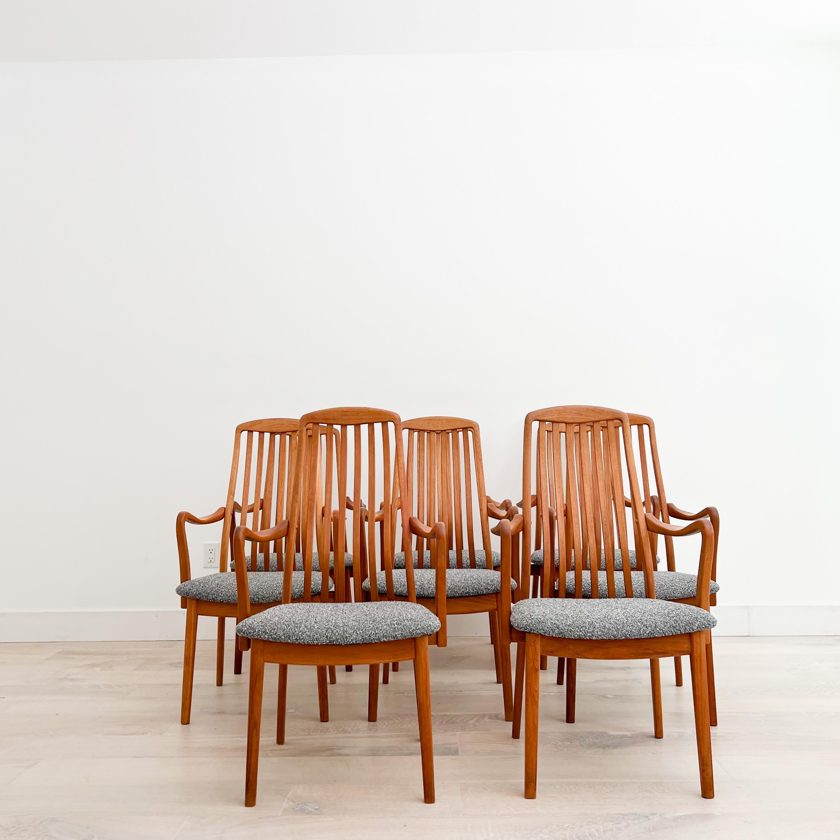 Set of 8 Danish teak dining chairs stamped Virsidan A/S (Aug 1992). These teak slatted back ergonomic frames are very comfortable. Brand new cool toned grey tweed upholstery. Some light scuffing/scratching to the teak. Some chairs frames are a