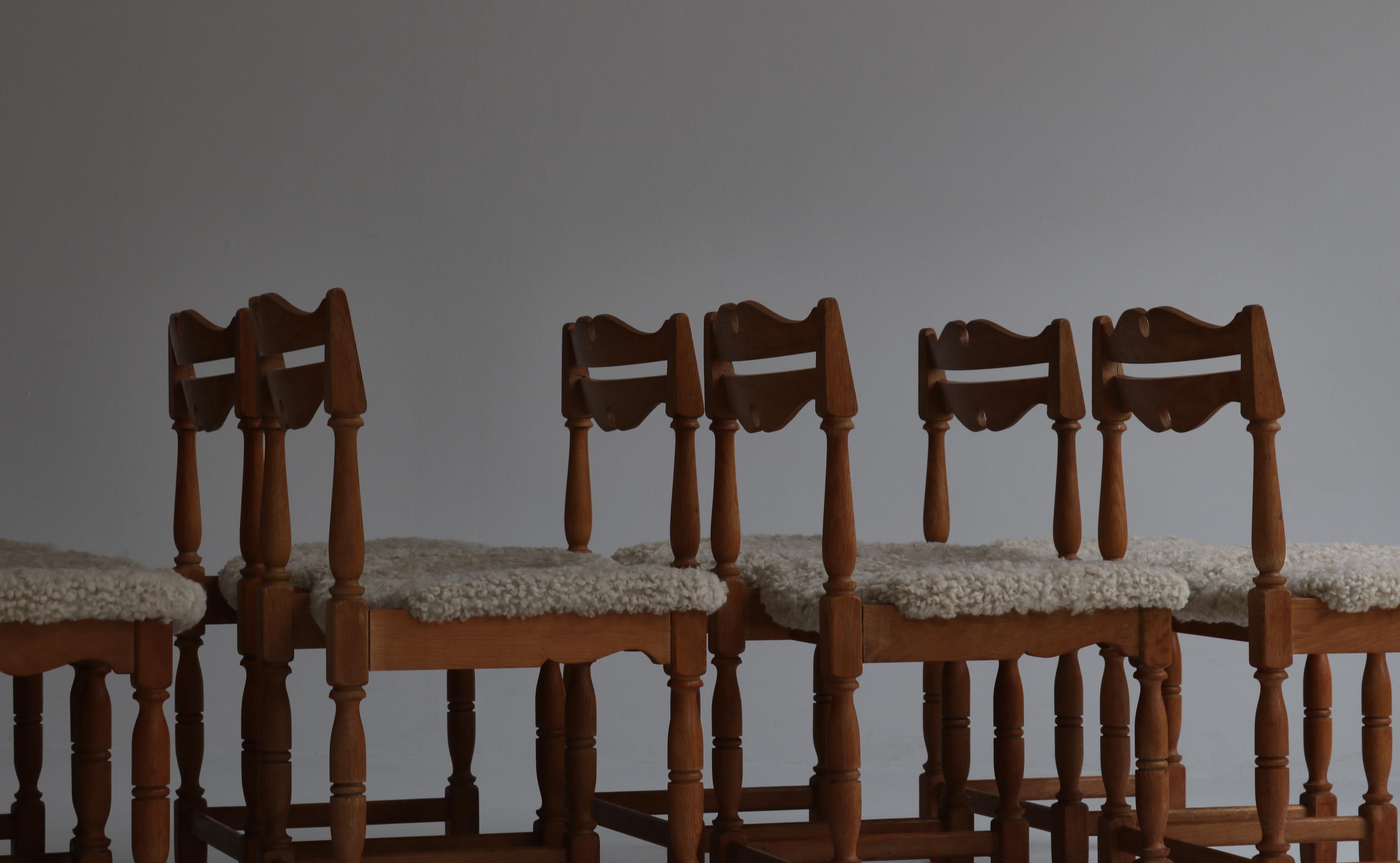 Set of 8 Dining Chairs by Henry Kjærnulf, Sheepskin & Oak, Denmark 6