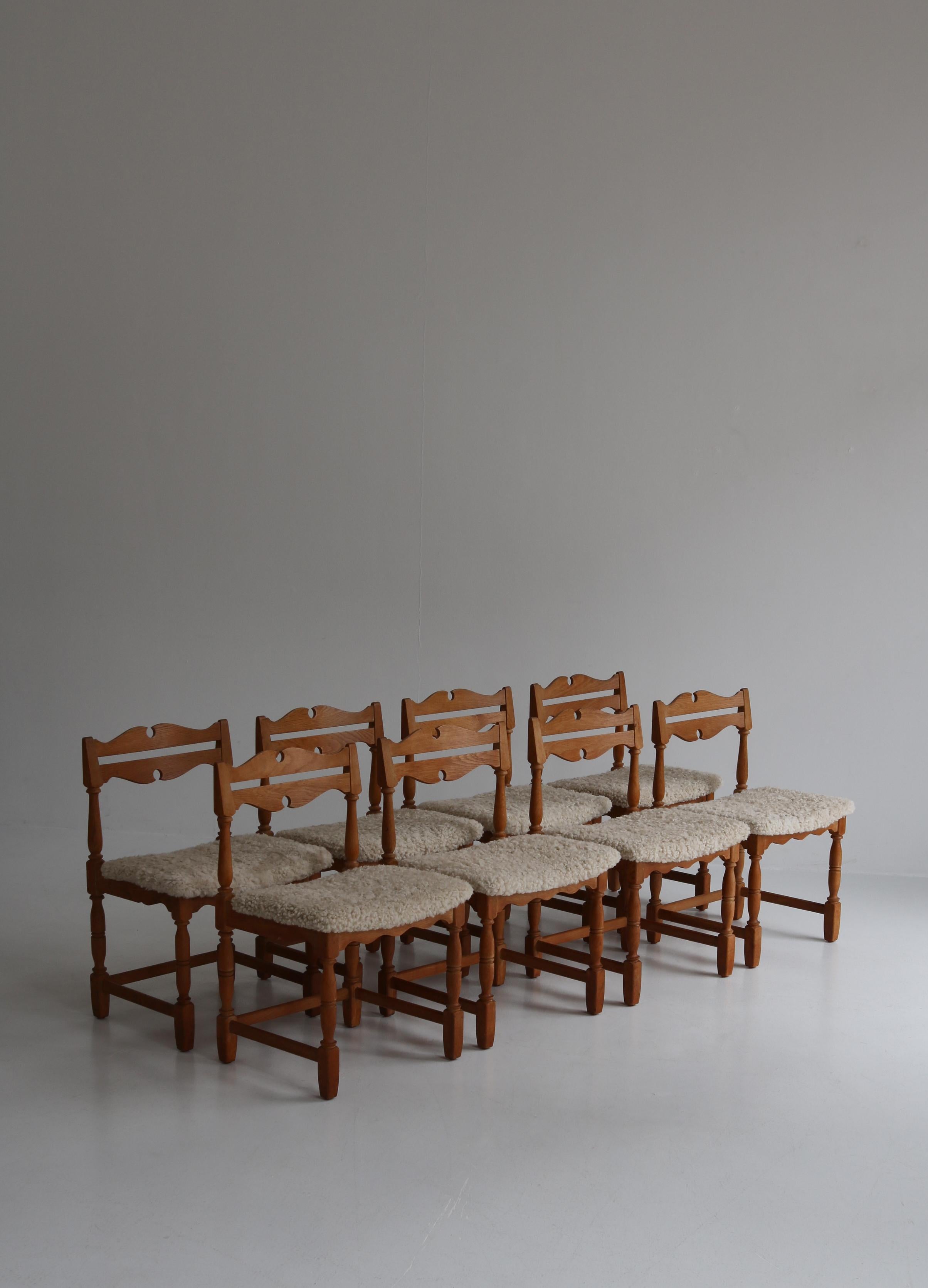 Scandinavian Modern Set of 8 Dining Chairs by Henry Kjærnulf, Sheepskin & Oak, Denmark