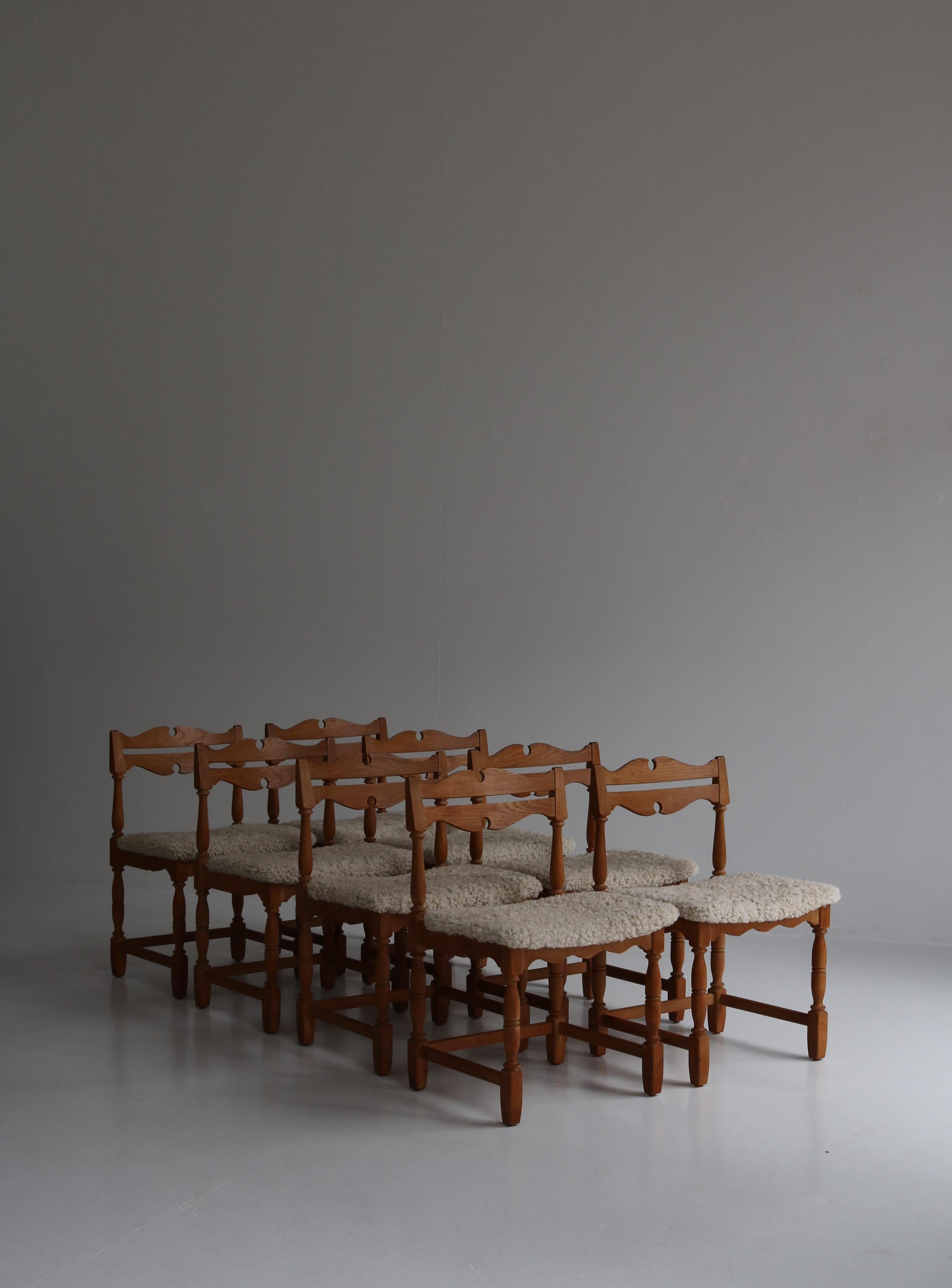Set of 8 Dining Chairs by Henry Kjærnulf, Sheepskin & Oak, Denmark 1
