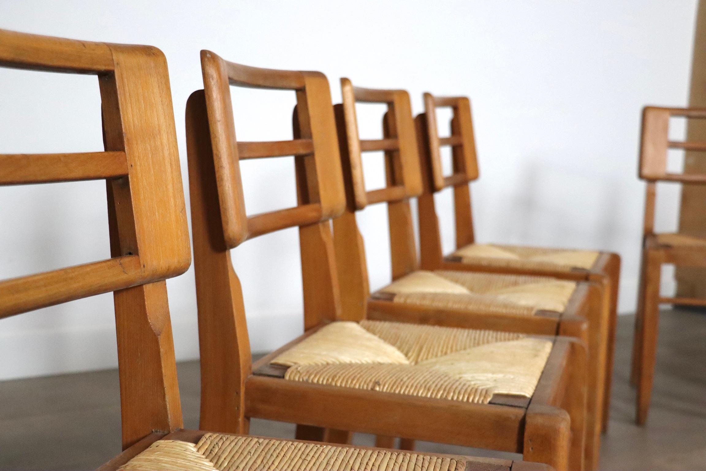 Mid-20th Century Set Of 8 Dining Chairs By Pierre Cruège In Oak And Straw, France 1950s