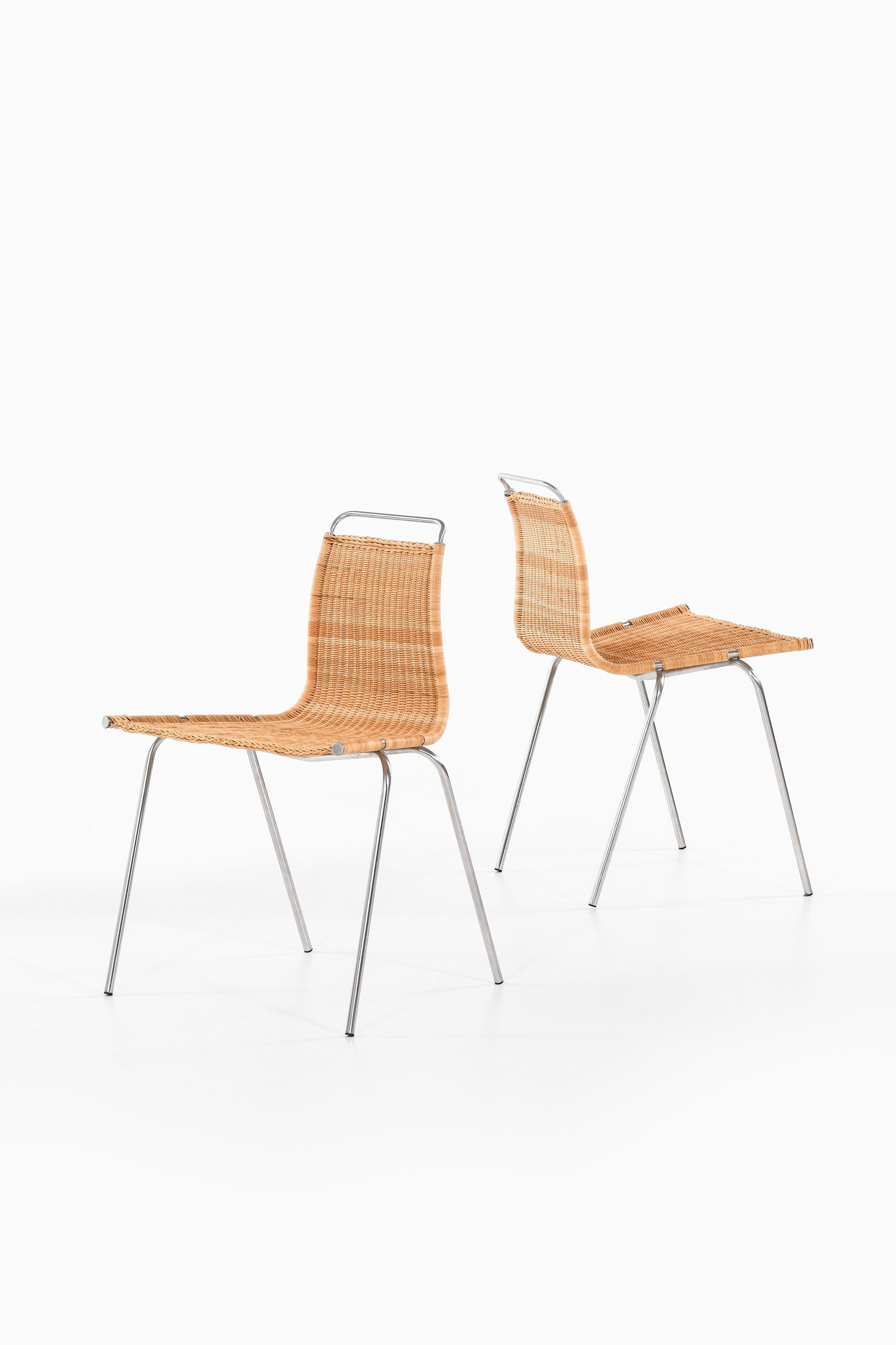 Set of 8 Dining Chairs in Chromed Steel and Woven Cane by Poul Kjærholm, 1950's

Additional Information:
Material: Chromed steel and woven cane
Style: Mid century, Scandinavia
Very rare set of 8 dining chairs model PK-1
Produced by E. Kold