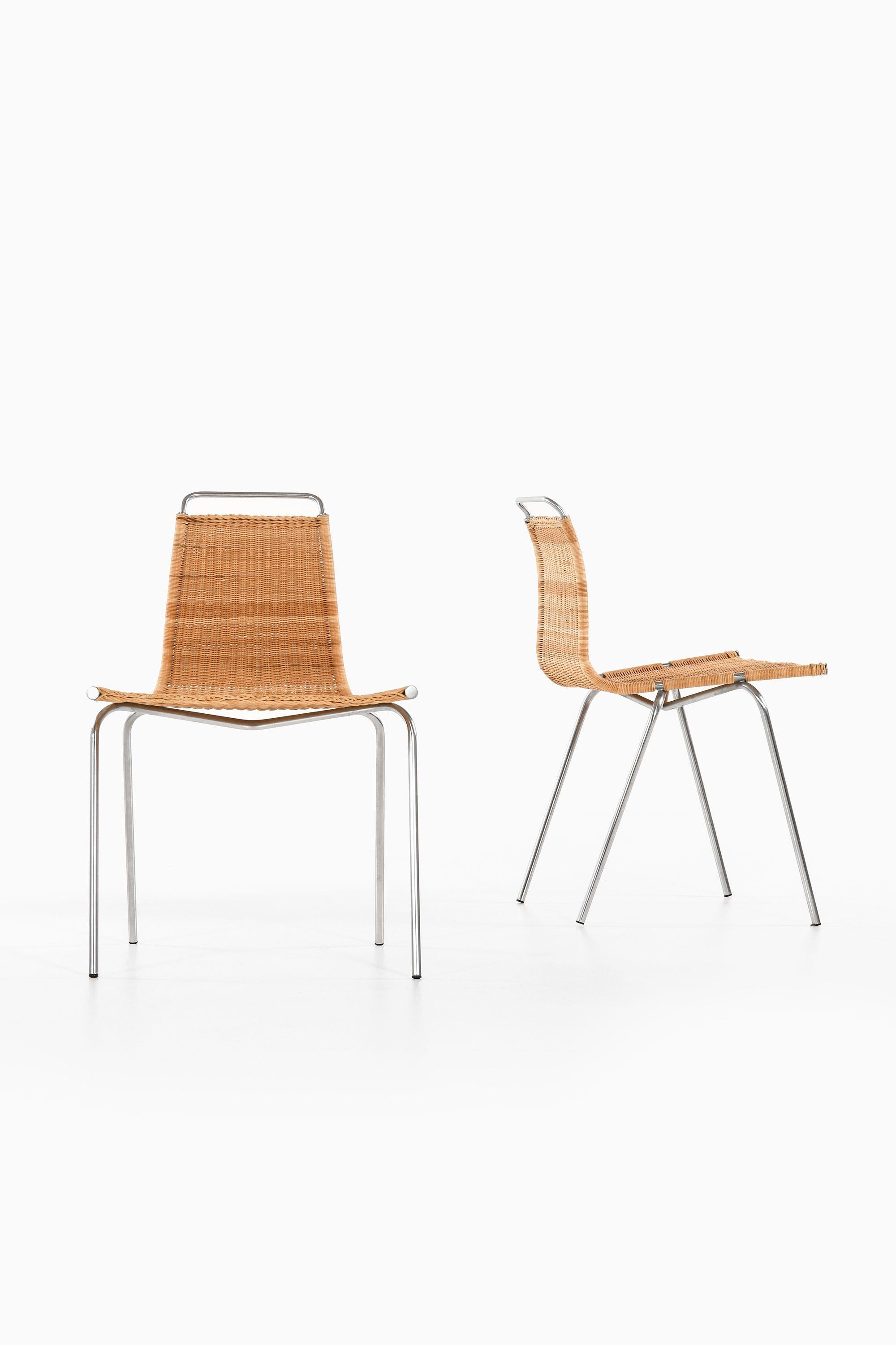 Scandinavian Modern Set of 8 Dining Chairs in Chromed Steel and Woven Cane by Poul Kjærholm, 1950's For Sale
