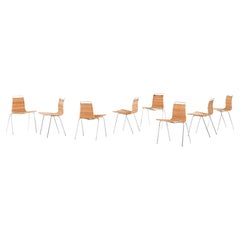 Ensemble de 8 chaises de salle à manger en acier chromé et canne tressée par Poul Kjærholm, années 1950