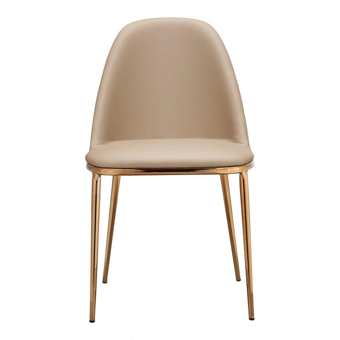 Contemporary chair with four legs in metal. Seat and backrest upholstered in faux leather. Elegant and soft steel structure with comfortable fine lines. A metal contour outlines the seat, giving a play of light that highlights the refined