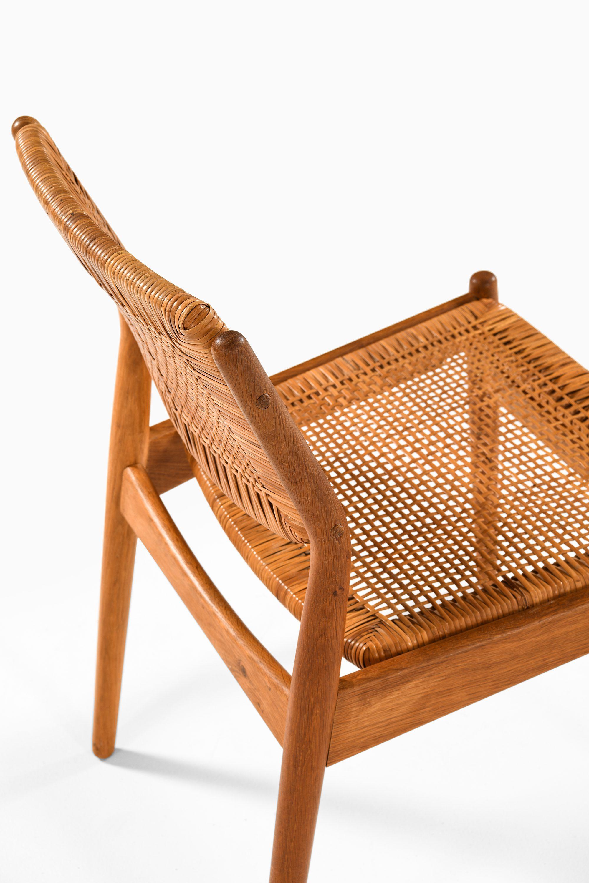 20th Century Set of 8 Dining Chairs in Oak and Woven Cane by Arne Vodder, 1951 For Sale