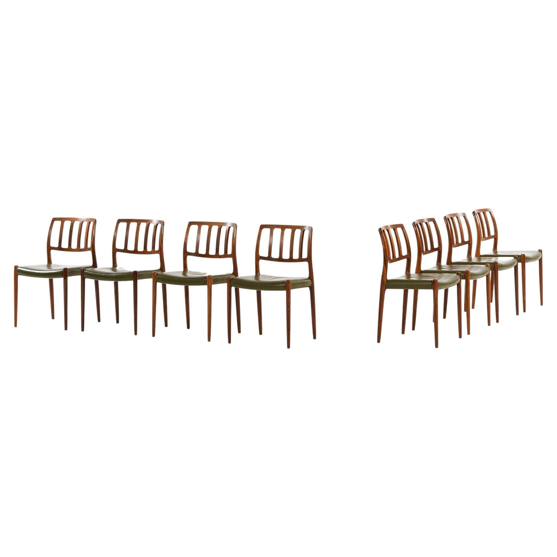 Set of 8 Dining Chairs in Rosewood and Green Leather by Niels O. Møller, 1970's
