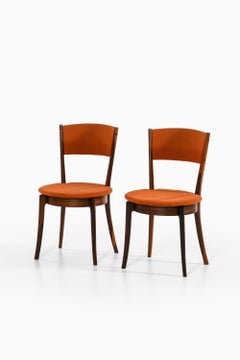 Satz von 8 Esszimmerstühlen aus Palisanderholz und Original-Stoff, 1960er Jahre