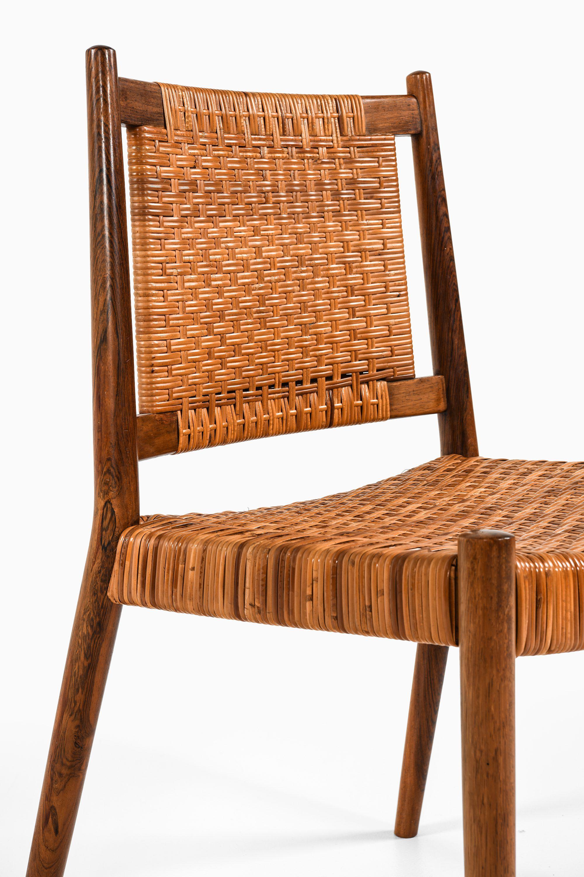 20th Century Set of 8 Dining Chairs in Rosewood and Woven Cane by Steffan Syrach-Larsen, 1960 For Sale