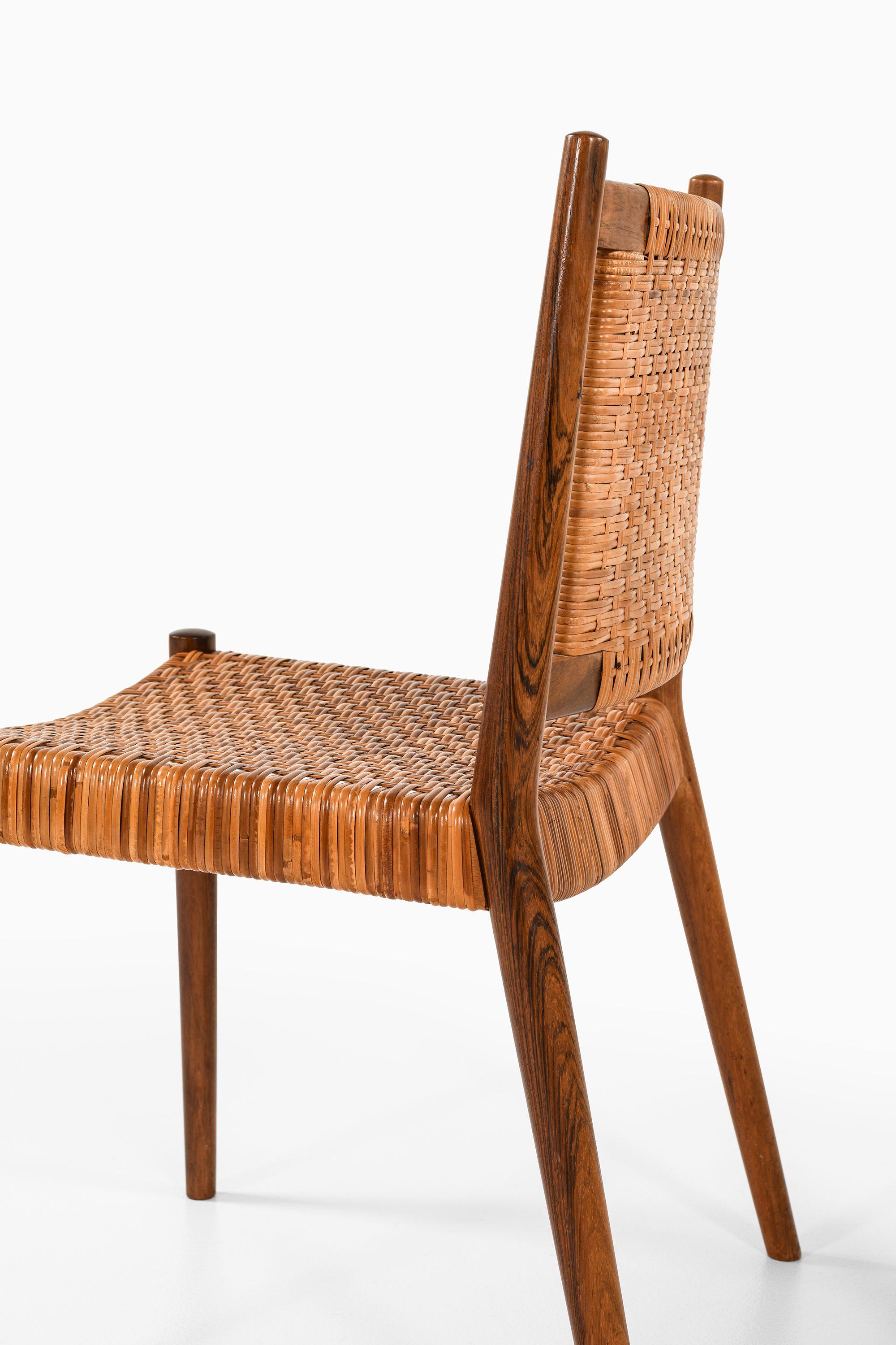Set of 8 Dining Chairs in Rosewood and Woven Cane by Steffan Syrach-Larsen, 1960 For Sale 1