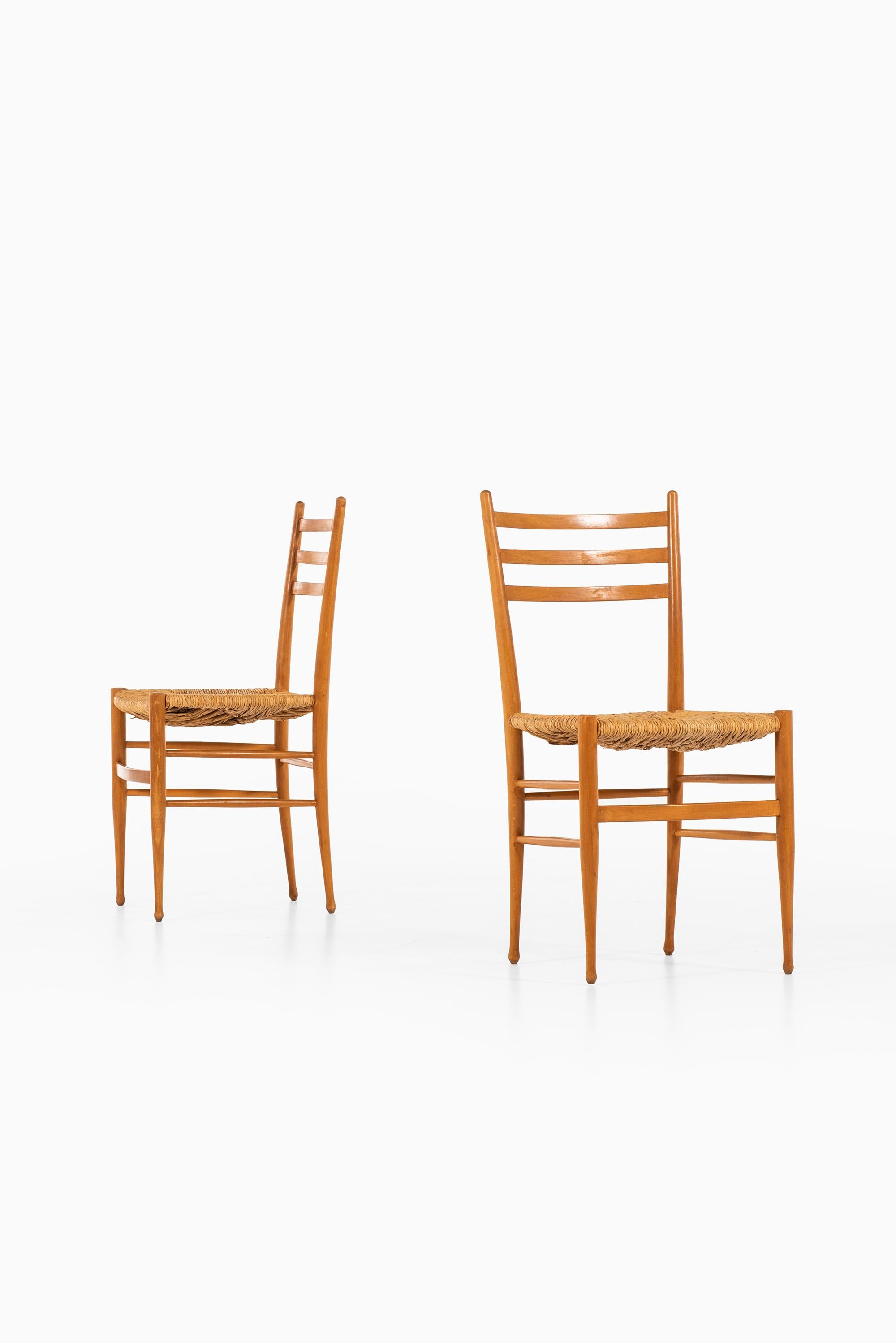 Mid-Century Modern Set of 8 Dining Chairs in the Style of Gio Ponti Produced in Italy