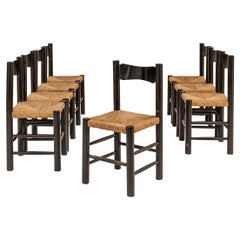 Set of 8 Dining Chairs in the Style of Perriand, France, 1950 ca.
