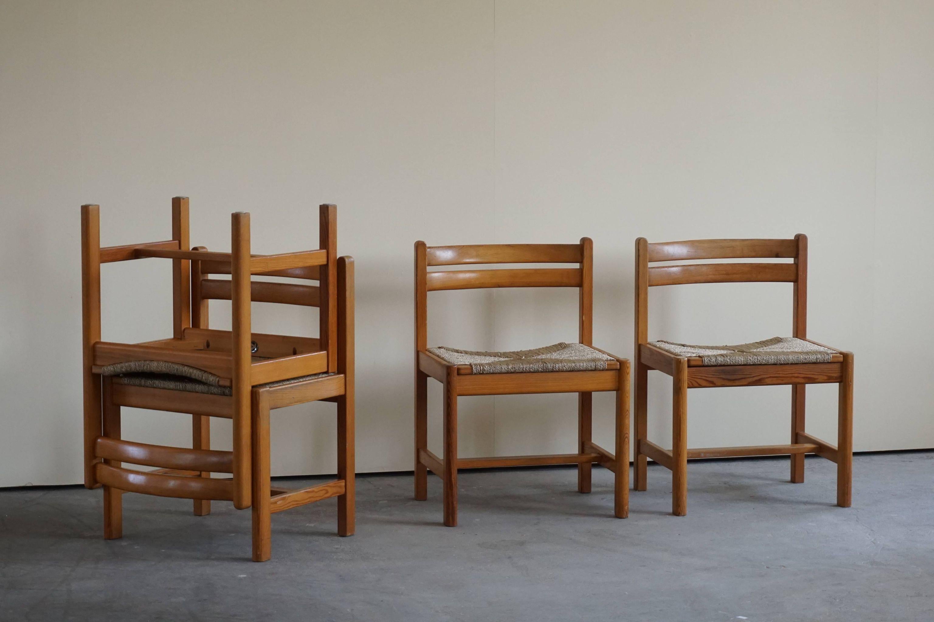 Set of 8 mid century Swedish dining chairs in solid oregon pine and new papercord on all chairs, model 