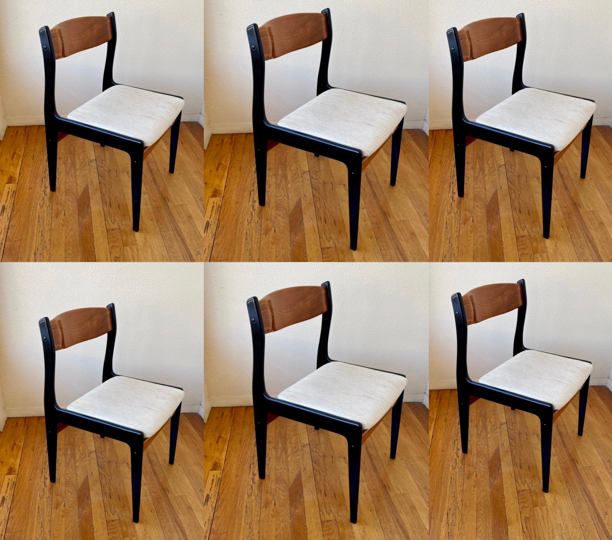 Great set of 8 Danish modern solid lacquer teak dining chairs circa 1960's, the chairs have been professionally lacquer and refinish the seat covers are ok, some show light stains easy to replace.