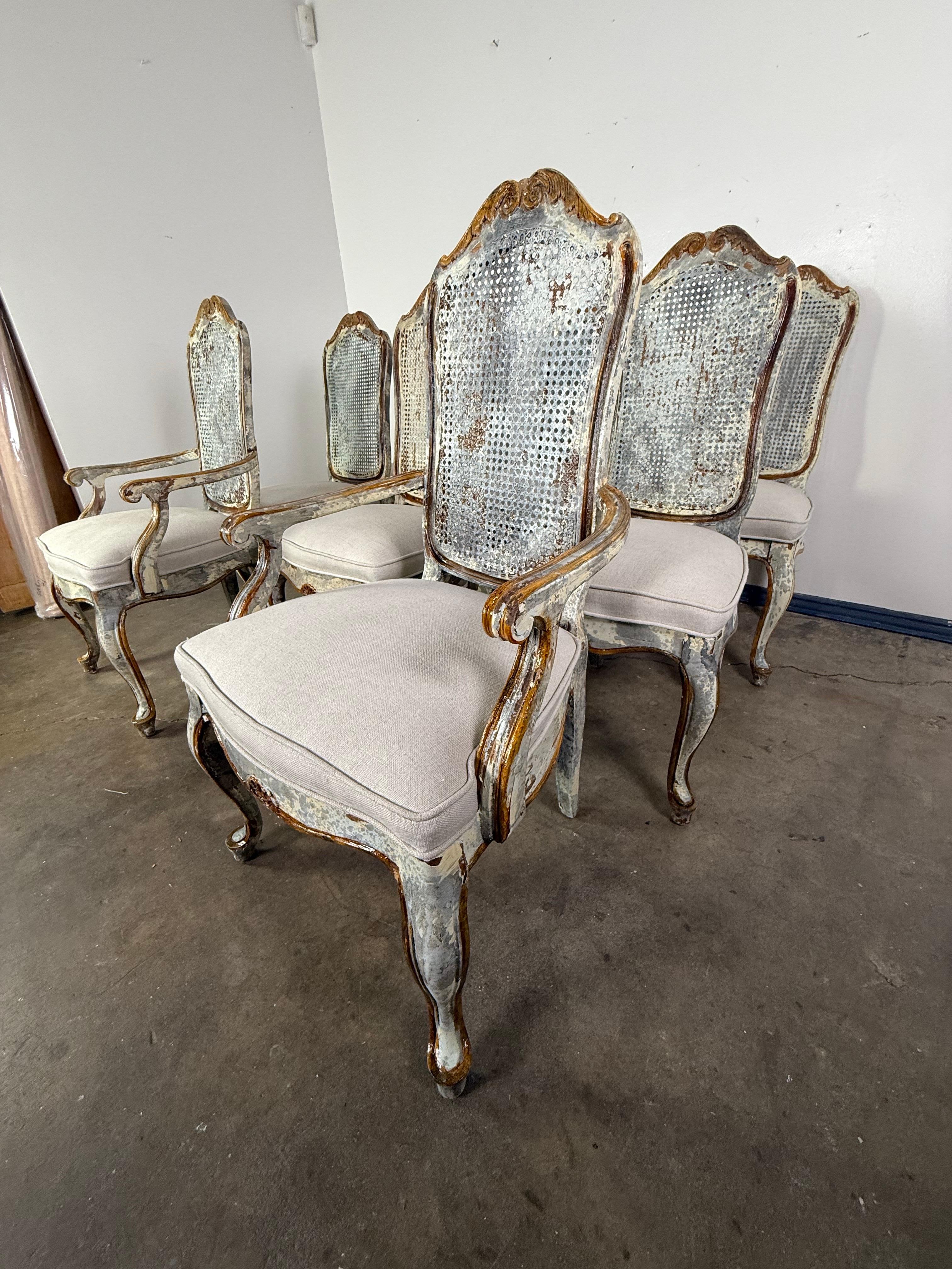 20th Century Set of 8 Distressed French Louis XV Style Dining Chairs with Cane Backs For Sale