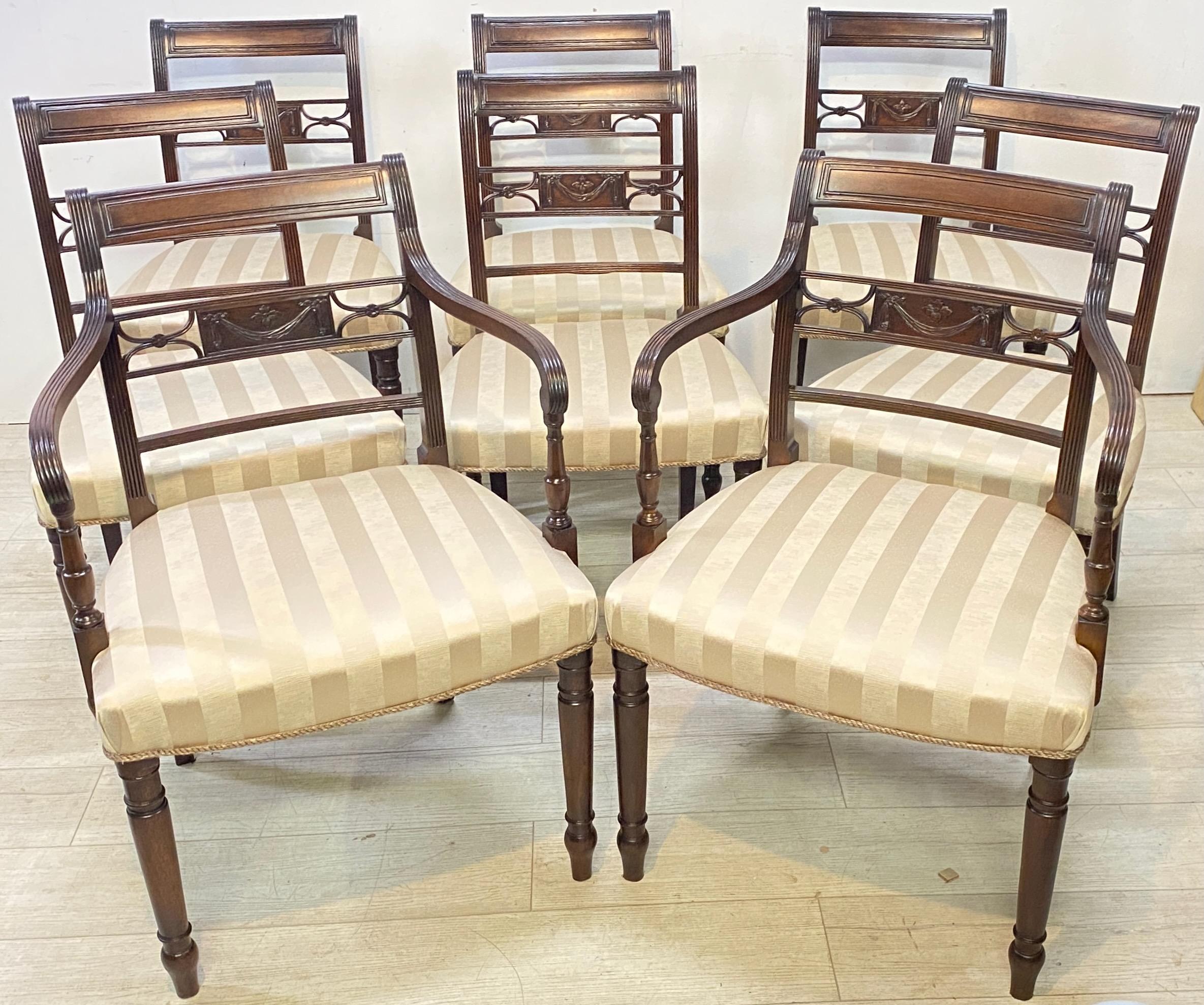A classic set of eight early 19th century George III period mahogany chairs in excellent condition. Consisting of two armchairs and six side chairs.
Recently re-upholstered and refreshed original finish. Very sturdy, extremely comfortable and ready