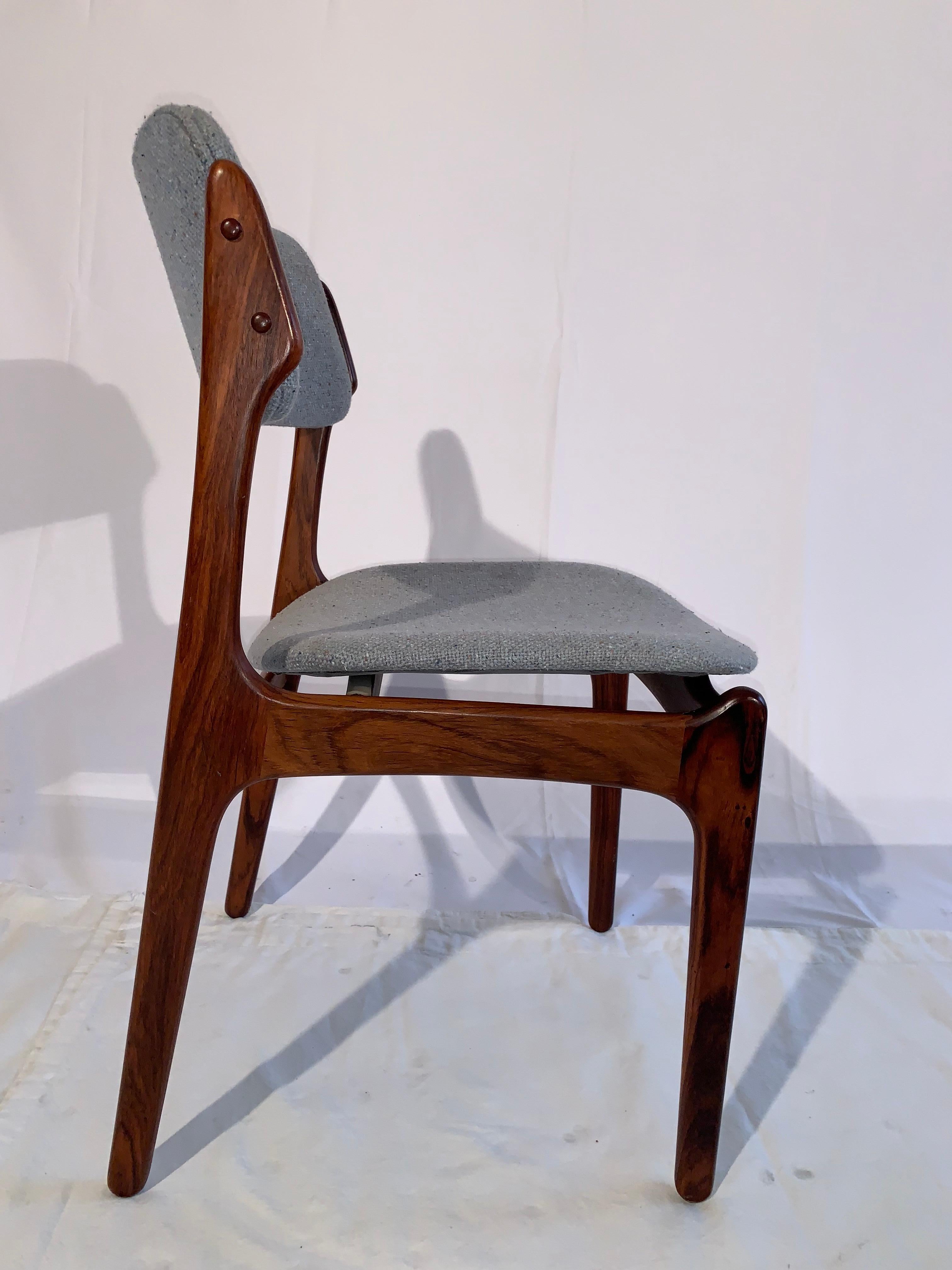 Just arrived!
A wonderful set of 8 rosewood Danish dining chairs by Erik Buch.
The frames have a striking rosewood grain. No wobbles or loose joints. The fabric is original and should be changed.