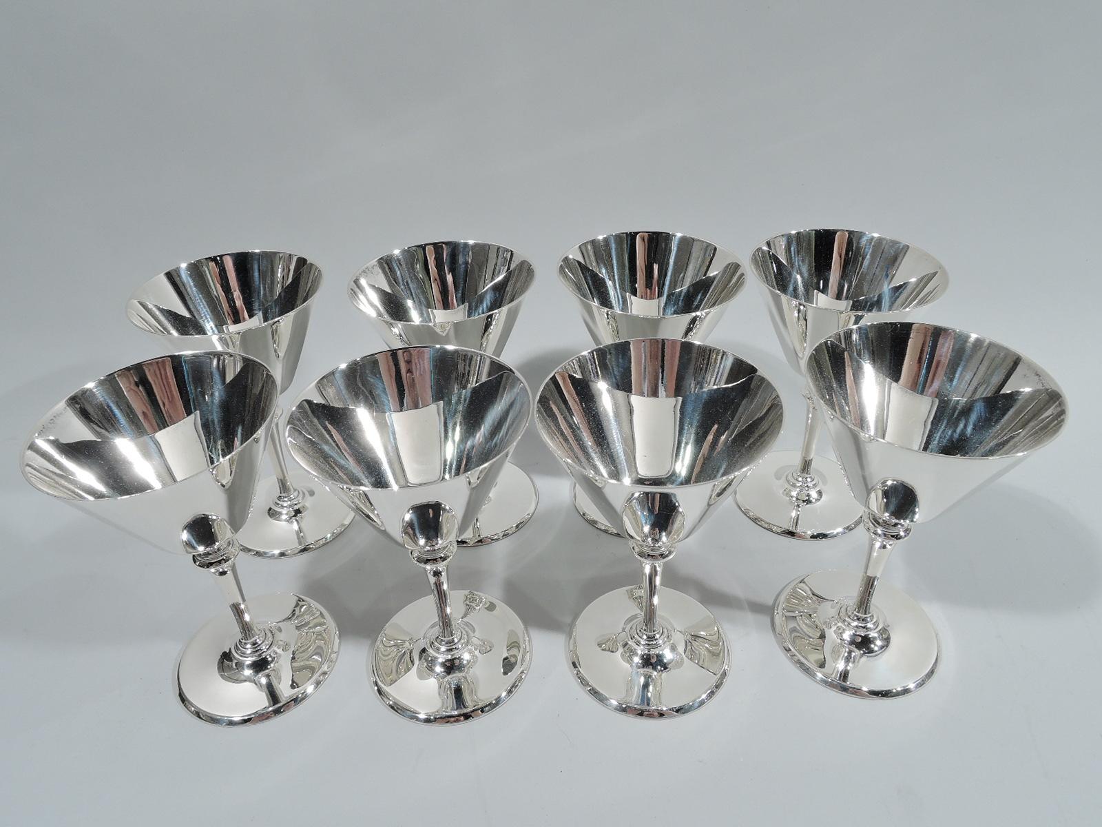 Set of 8 Fabulous Art Deco sterling silver cocktail cups. Made by Tiffany & Co. in New York, ca 1922. Each: Conical bowl on tapering stem on raised round foot. Fully marked including pattern no. 20037 (first produced in 1922) and director’s letter
